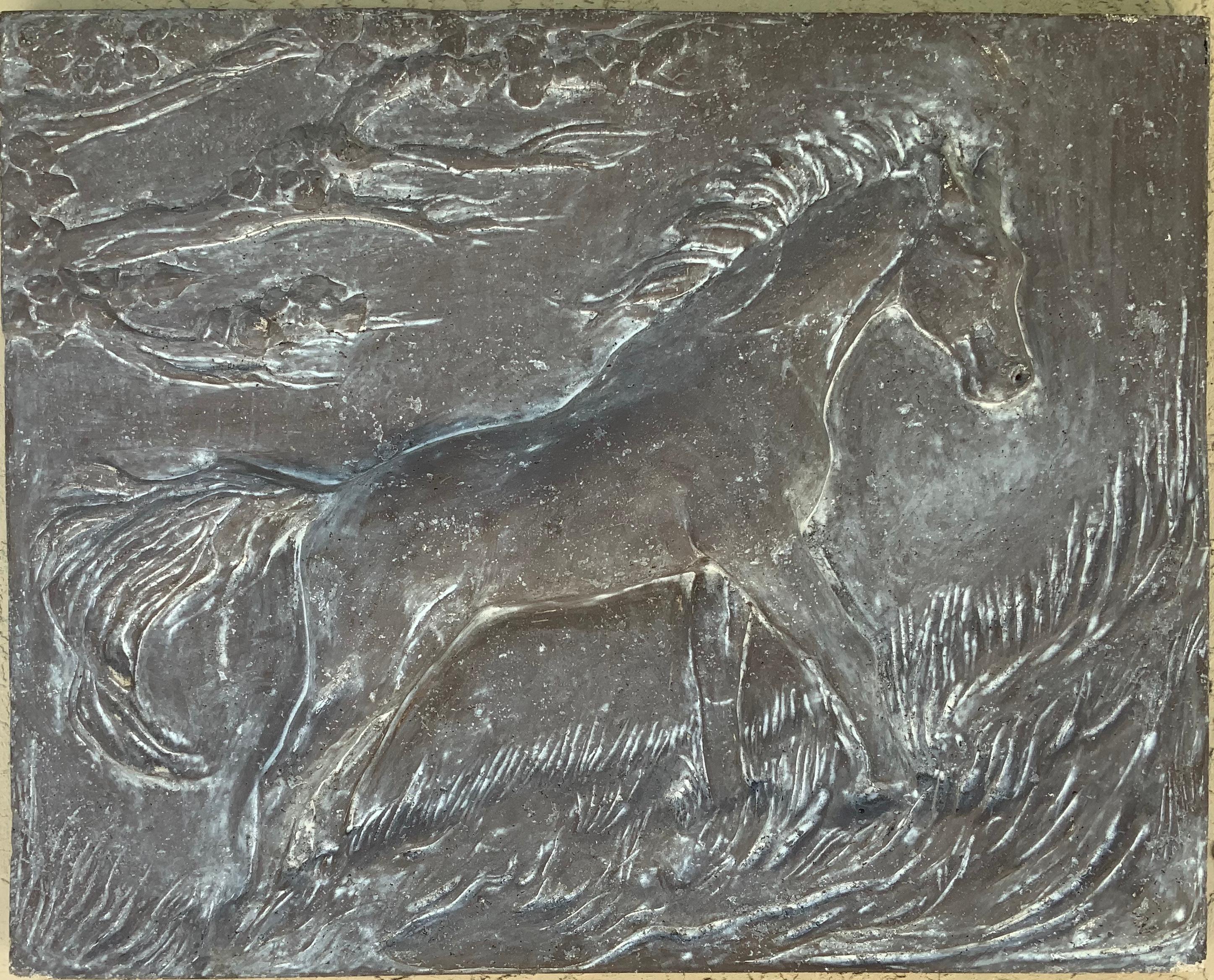 One of a kind plaster wall panel made by unknown NC artist, of sculpture depicts a raised molded detailed running horse in the field in dramatic look and movements.