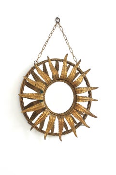 Wall Hanging Sunburst Mirror in Gilt Iron with Foliage Frame, France 1940s