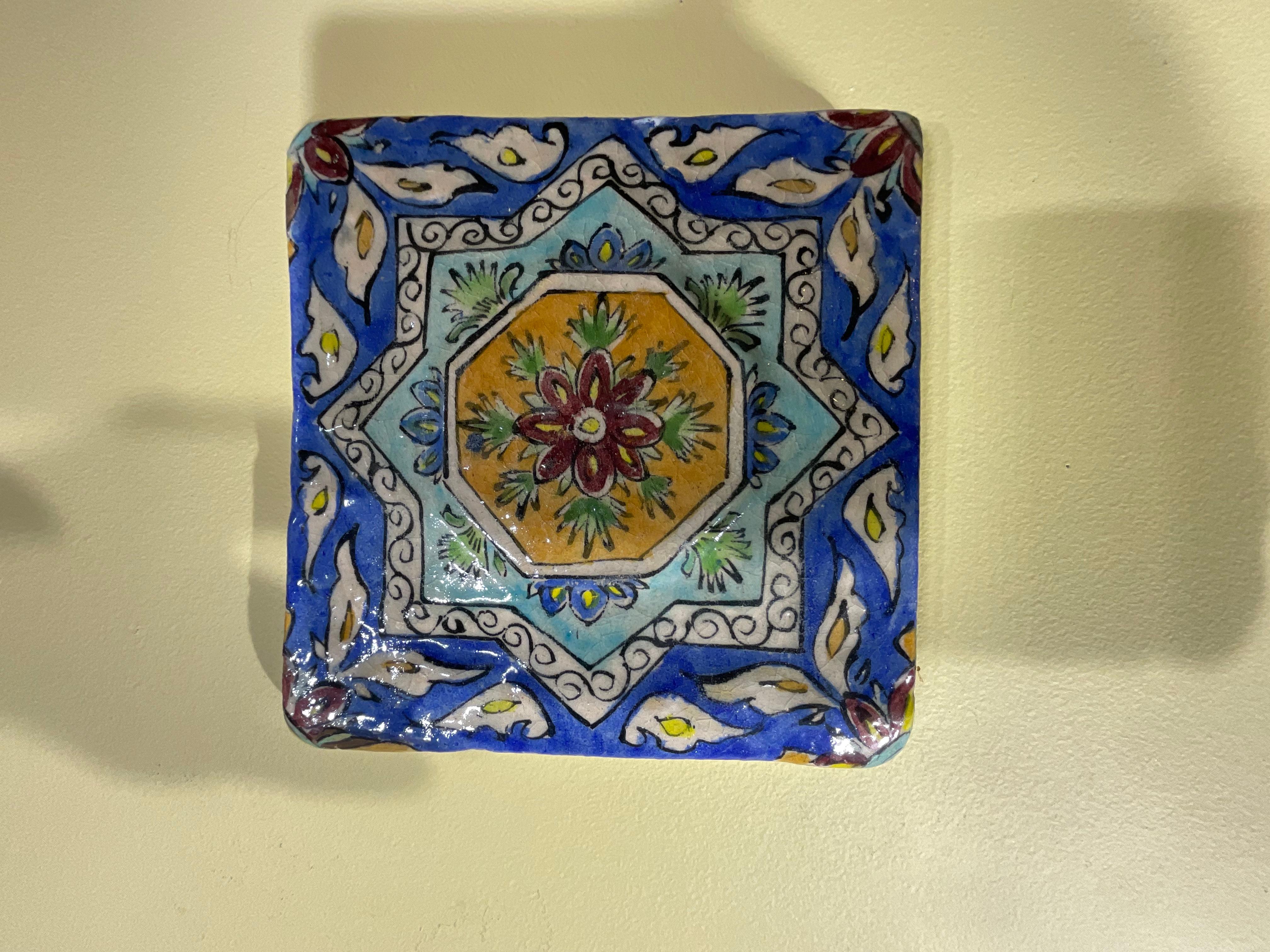 hanging decorative tiles on wall