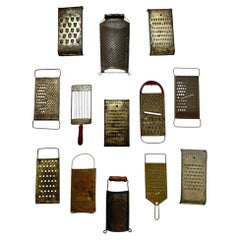 Thirteen Antique Metal Kitchen Graters: Wall Decor from 1930