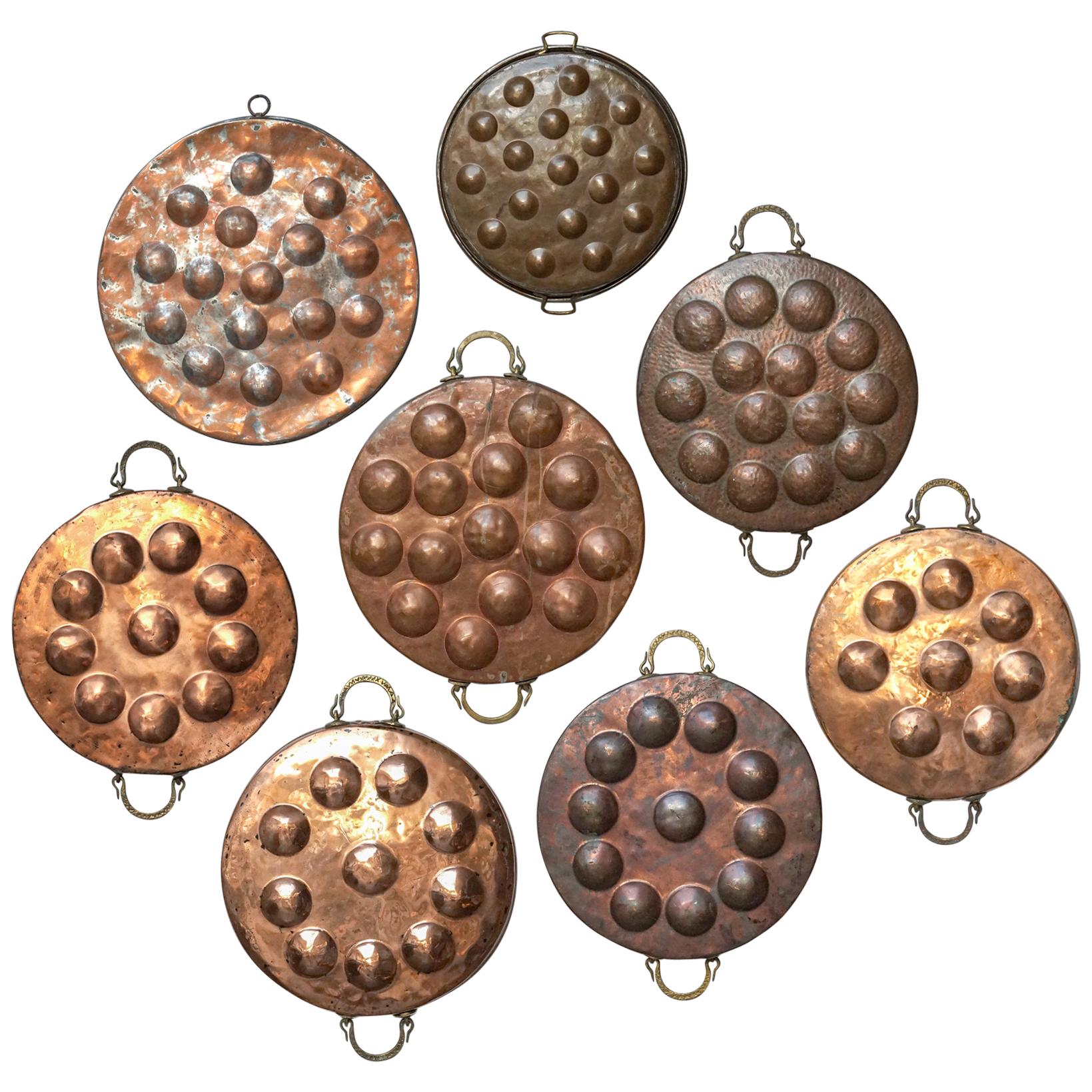 Wall Kitchen Collection of Eight 19th Century French Copper Egg Poacher Pans
