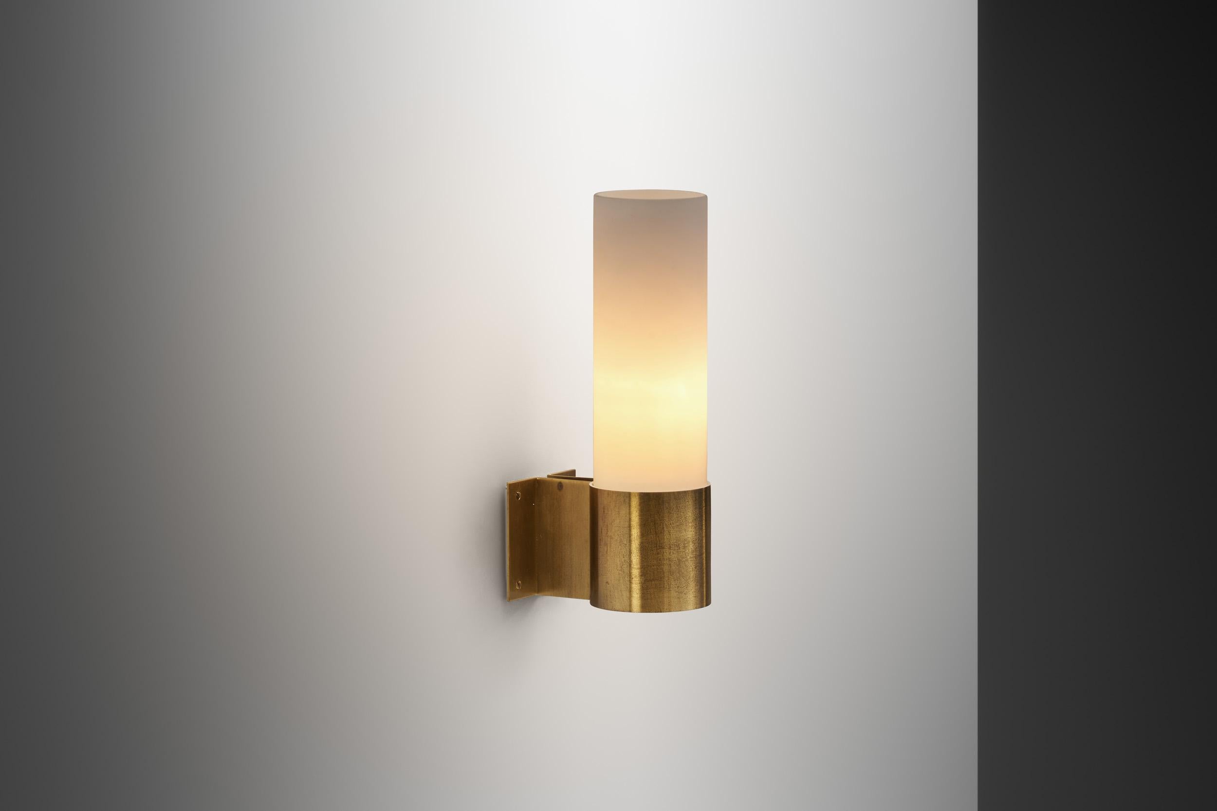 This wall lamp of Fog & Mørup production was designed by architect and designer Professor Jørgen Bo. Like the architect/designer’s other creations, the wall sconce is brilliant in its simplicity. A truely timeless piece.

Dating from the late 1960s,