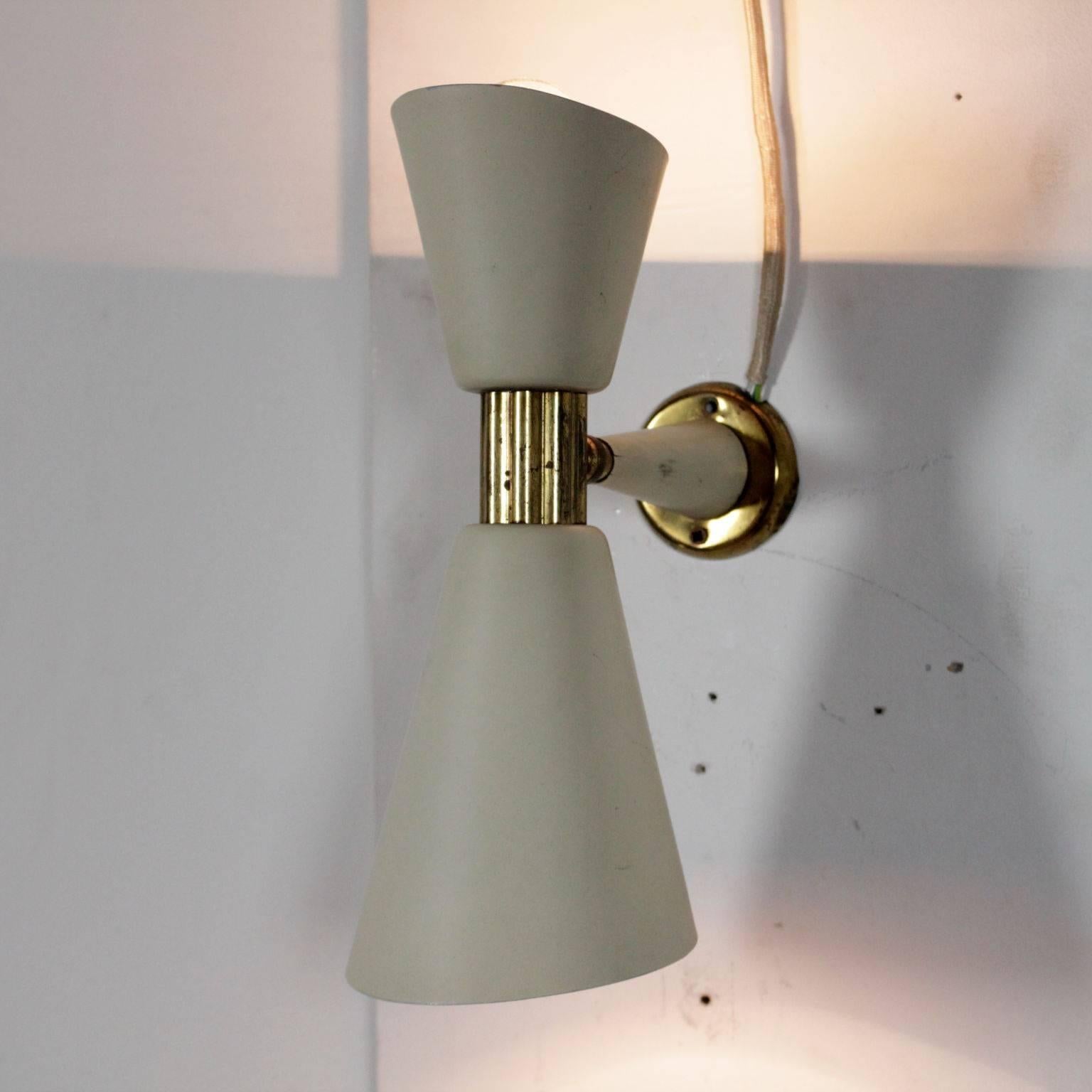 A wall lamp, brass, aluminium and steel. Manufactured in Italy, 1950s.