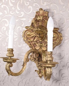 Wandleuchte. Bronze.