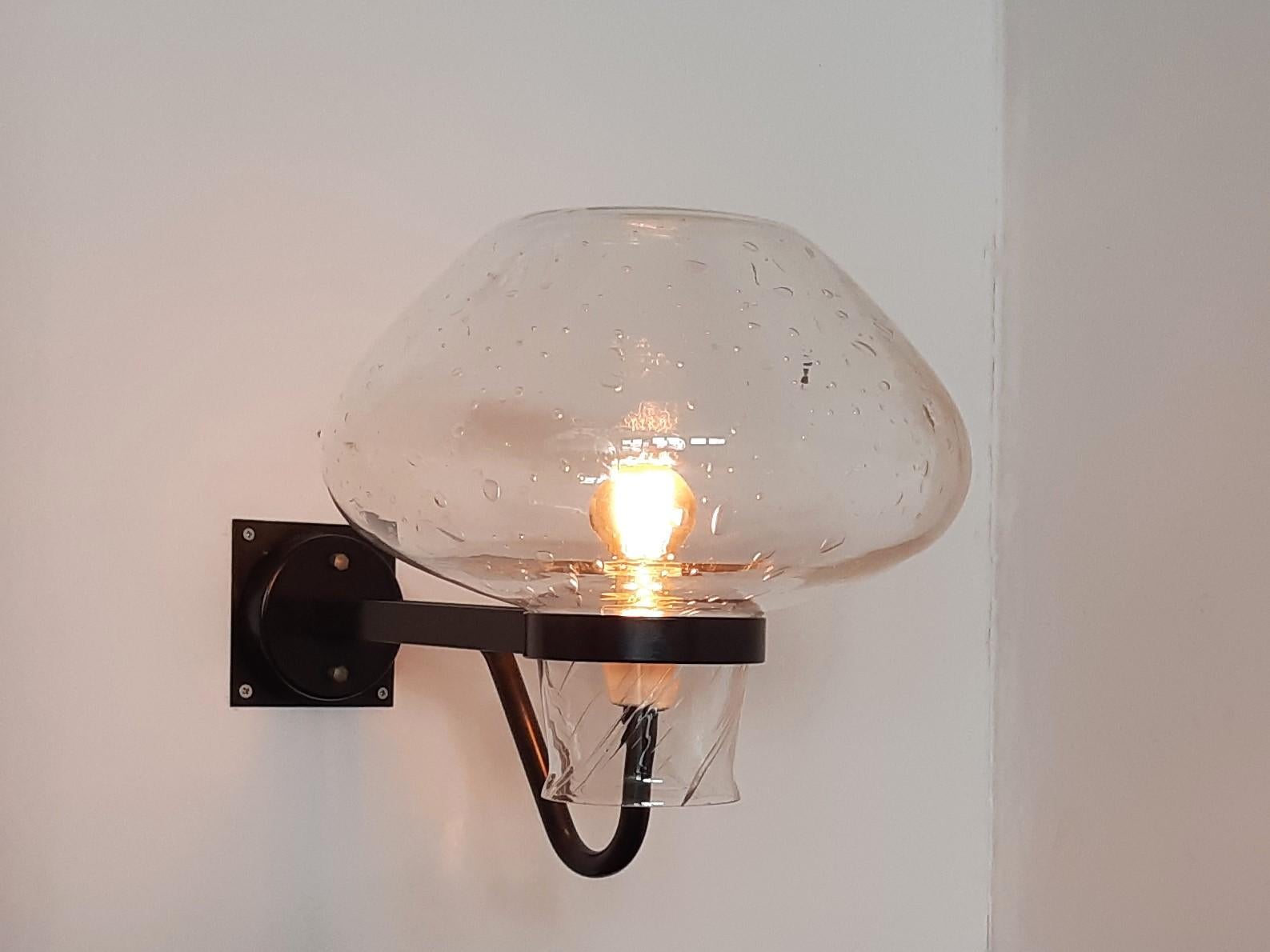 This large size wall lamp is a design by Gunnar Asplund from Sweden. Other fixtures are sometimes labelled or marked by Asea. Always used indoors and therefore in beautiful condition. We have 2 lights available.