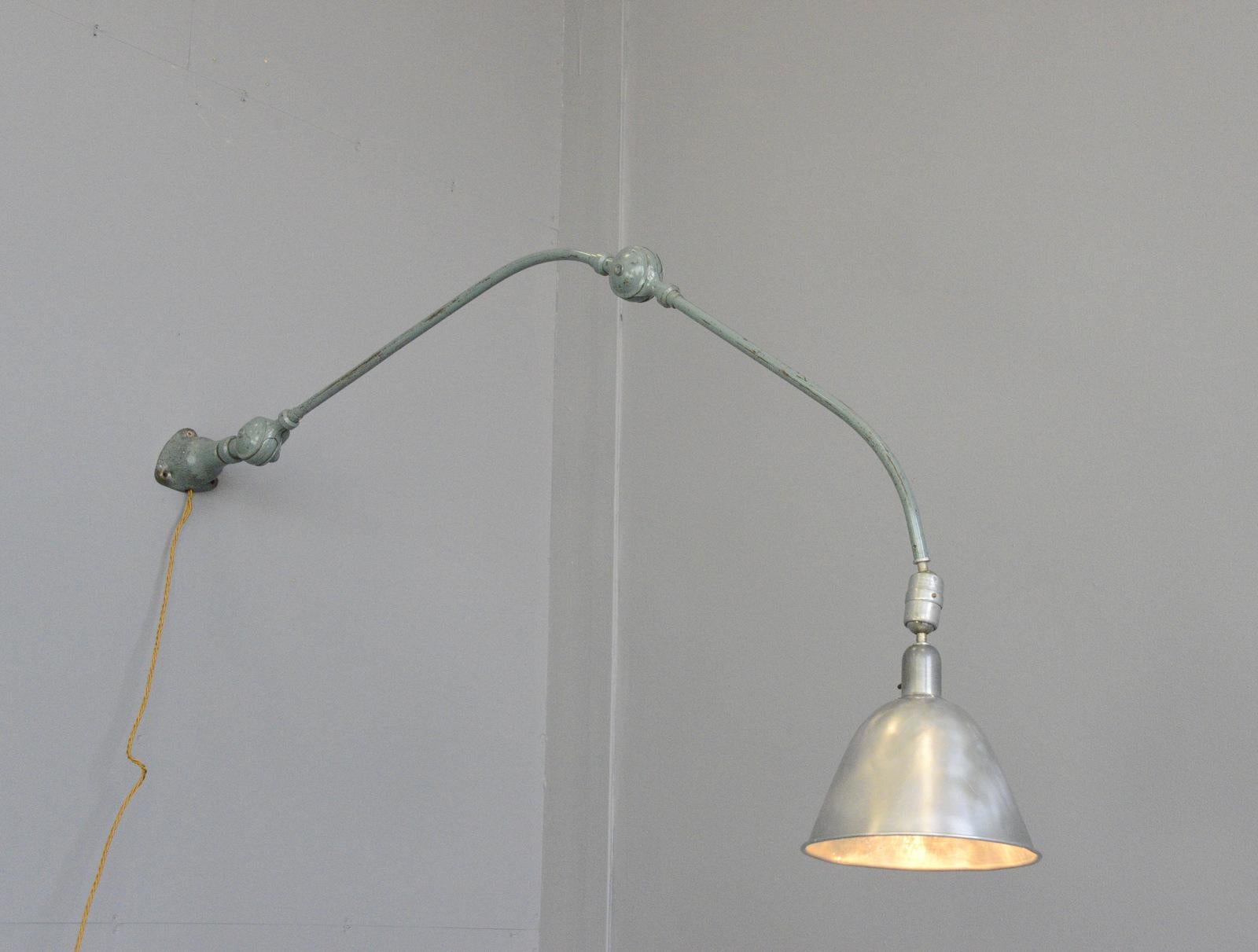 Wall lamp by Johan Petter Johansson for triplex

- Articulated tubular steel arms and joints
- Aluminium shade
- Original on/off switch on the shade
- Turns 180 from the wall
- Takes E27 fitting bulbs
- Designed by Johan Petter Johansson
-