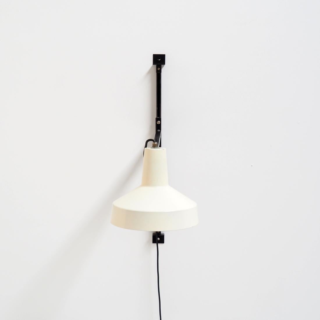 Modern lamp designed by Dutch designer Niek Hiemstra for Hiemstra Evolux in the 1960’s. The shade is fully adjustable just like the arm. It’s adjustable in depth, in height and from left to right.

In full original condition with minimal wear and