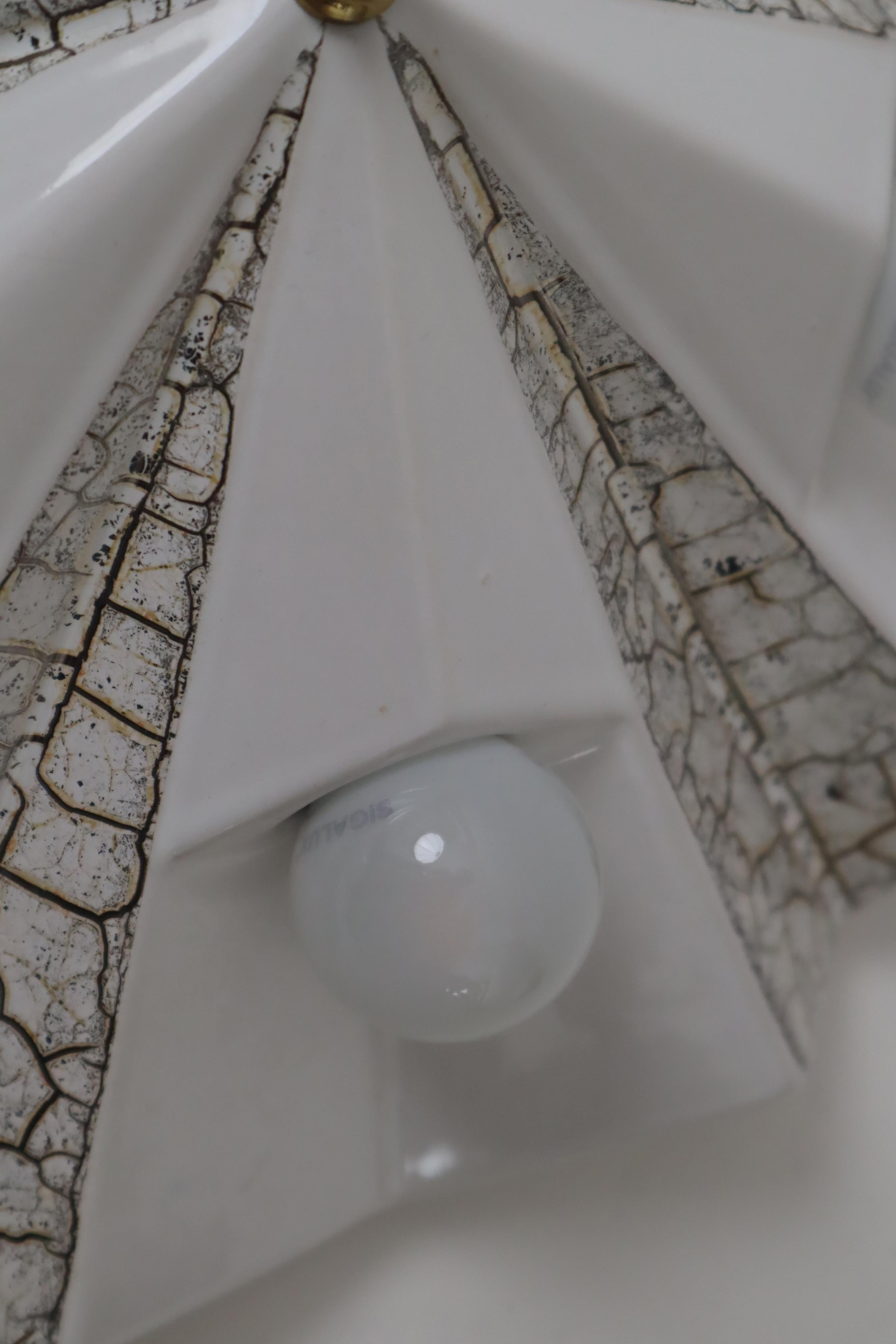 Brass Wall lamp by Pan ceramic in the shape of a white golden star, Germany 1970s For Sale