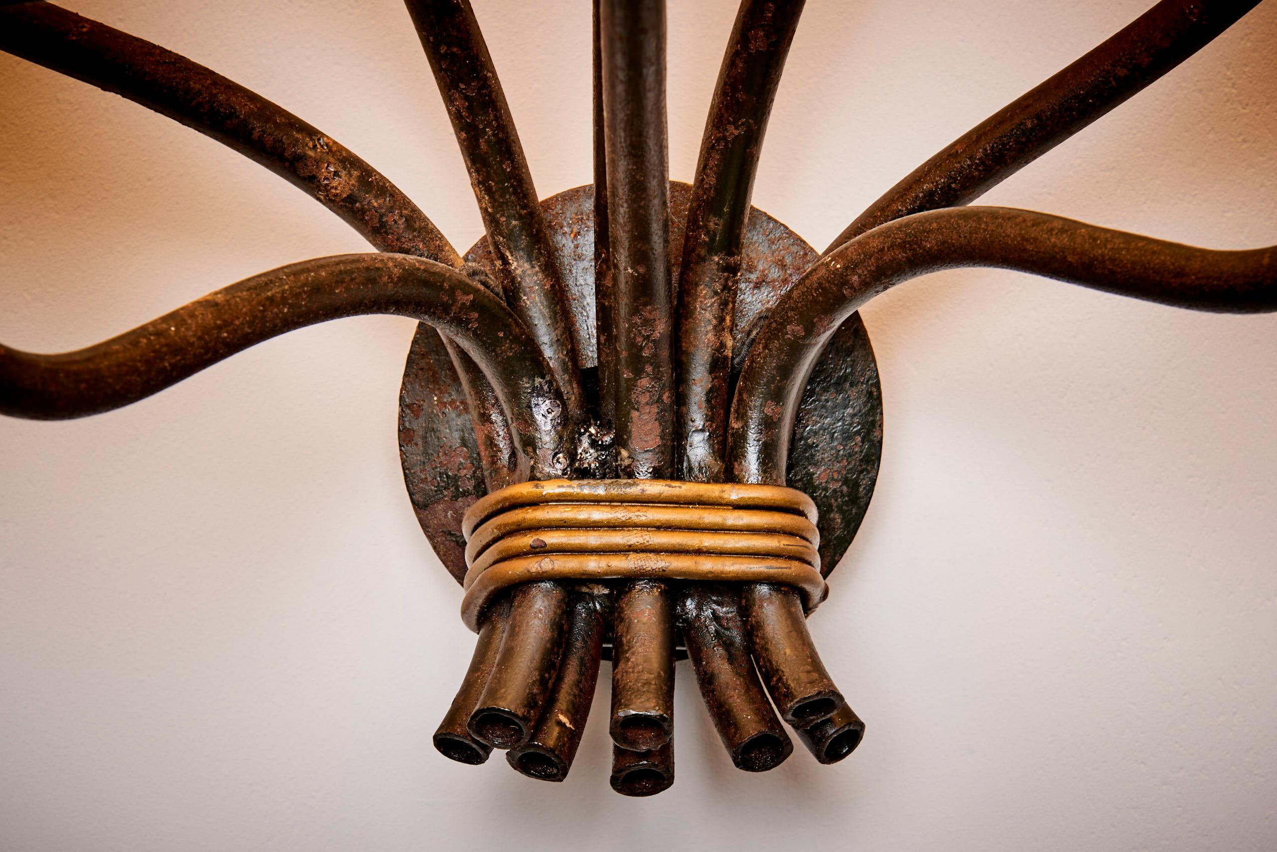 Metal Wall Lamp in the manner of Jean Royere with 8 Branches France 1950s