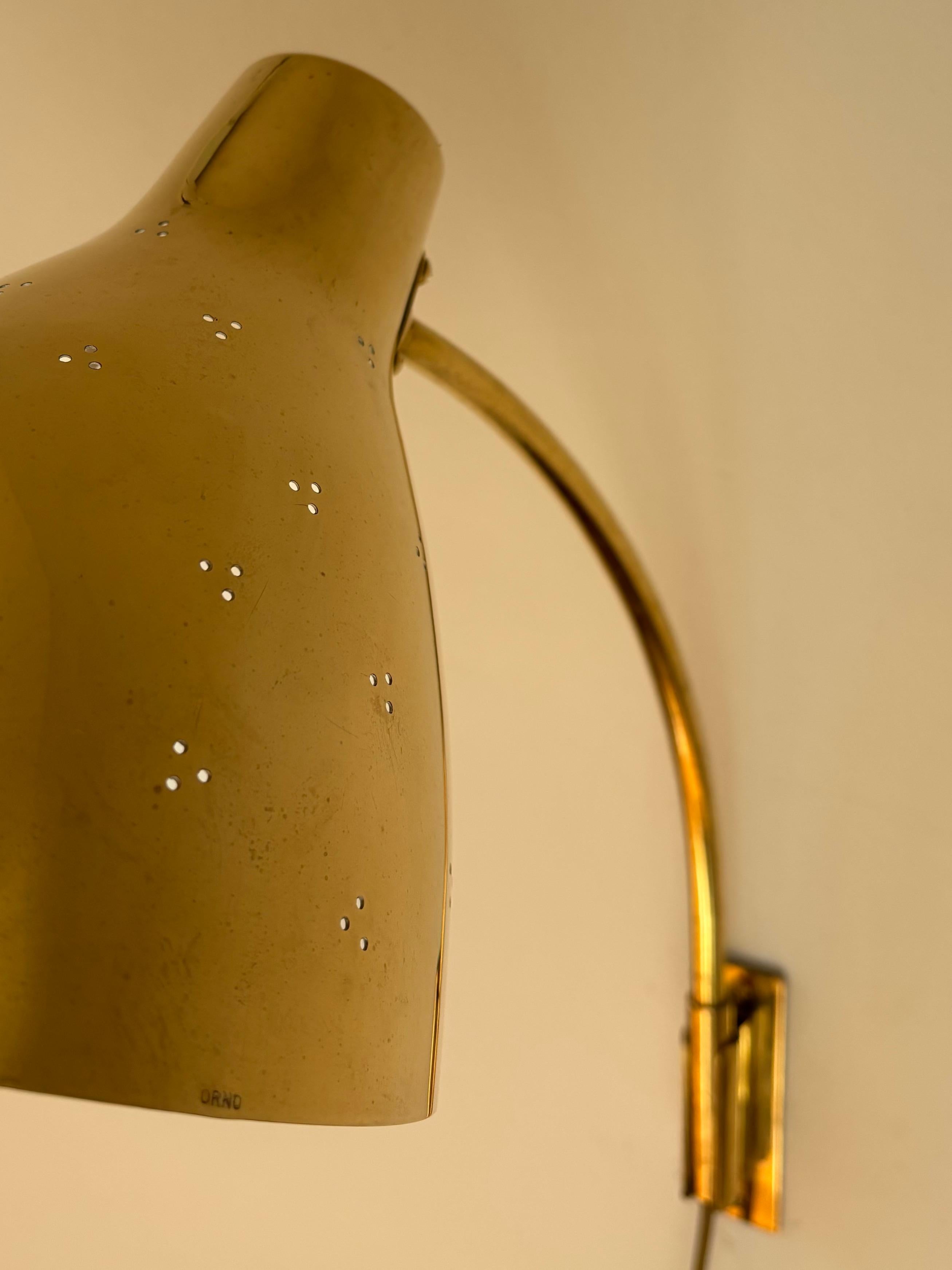 Wall lamp model “50-055”
Manufactured by Orno OY
Finland, 1951
Brass

Measurements
17,5 cm L × 33 cm W x 31 cm H

Condition
Nice patina. Excellent condition. Electrical system has been replaced recently.

Provenance
Private collection,