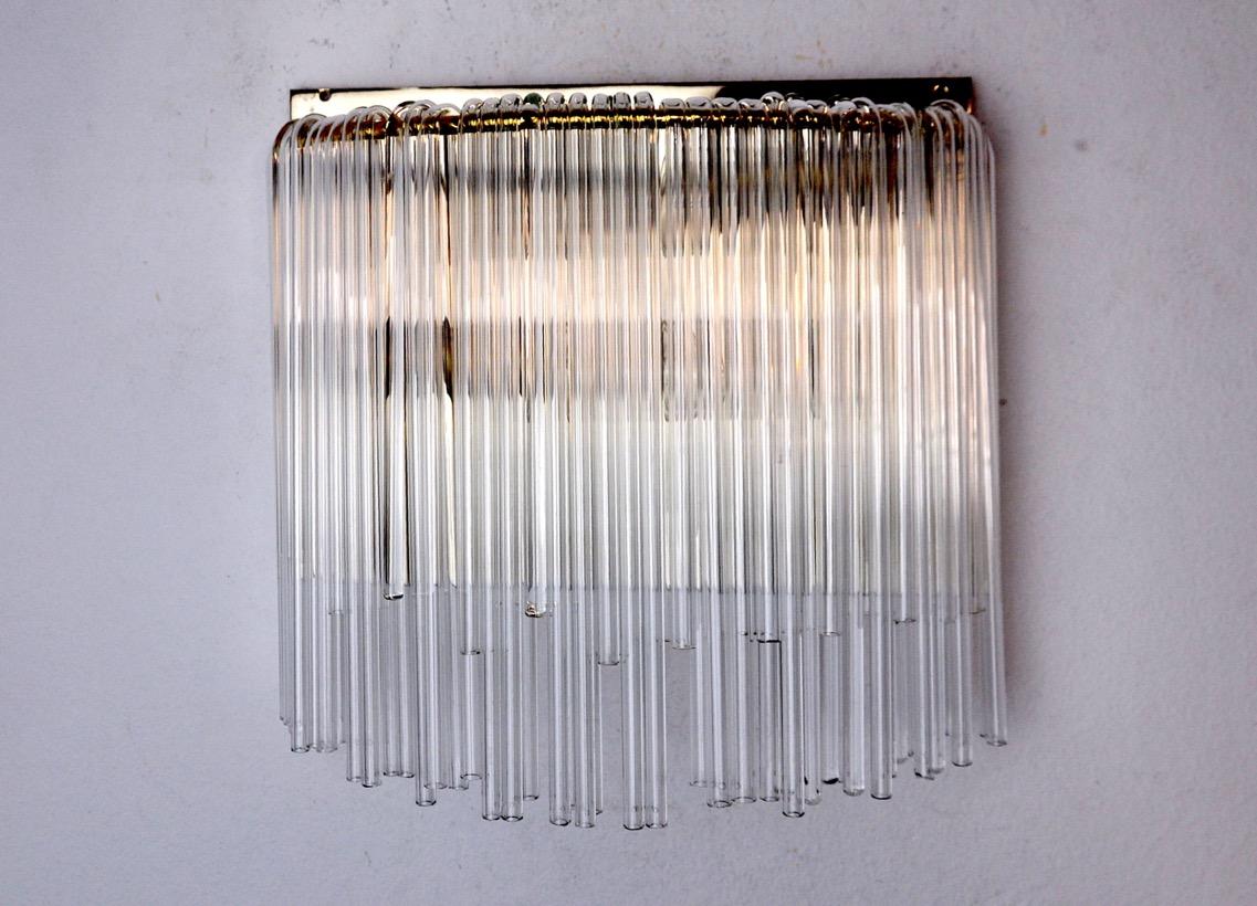 Rare Venini wall lamp dating from the 70s made up of murano glass rods. Magnificent decorative objects that will illuminate your interior. Electricity checked. Crystals in perfect condition. 

 