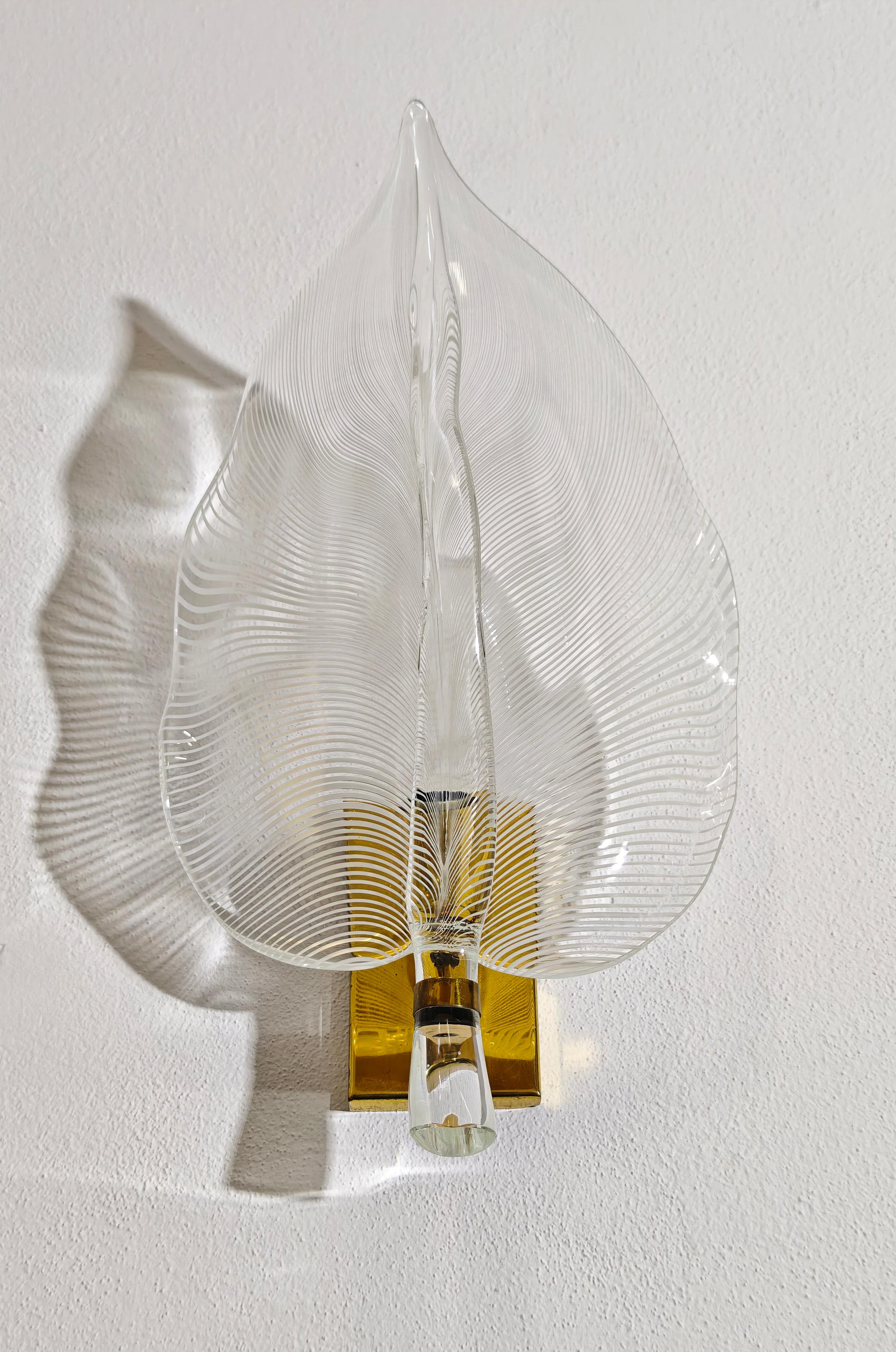 Wall lamp with brass frame and half-filigree blown glass leaf Franco Luce 70s in vendita 1