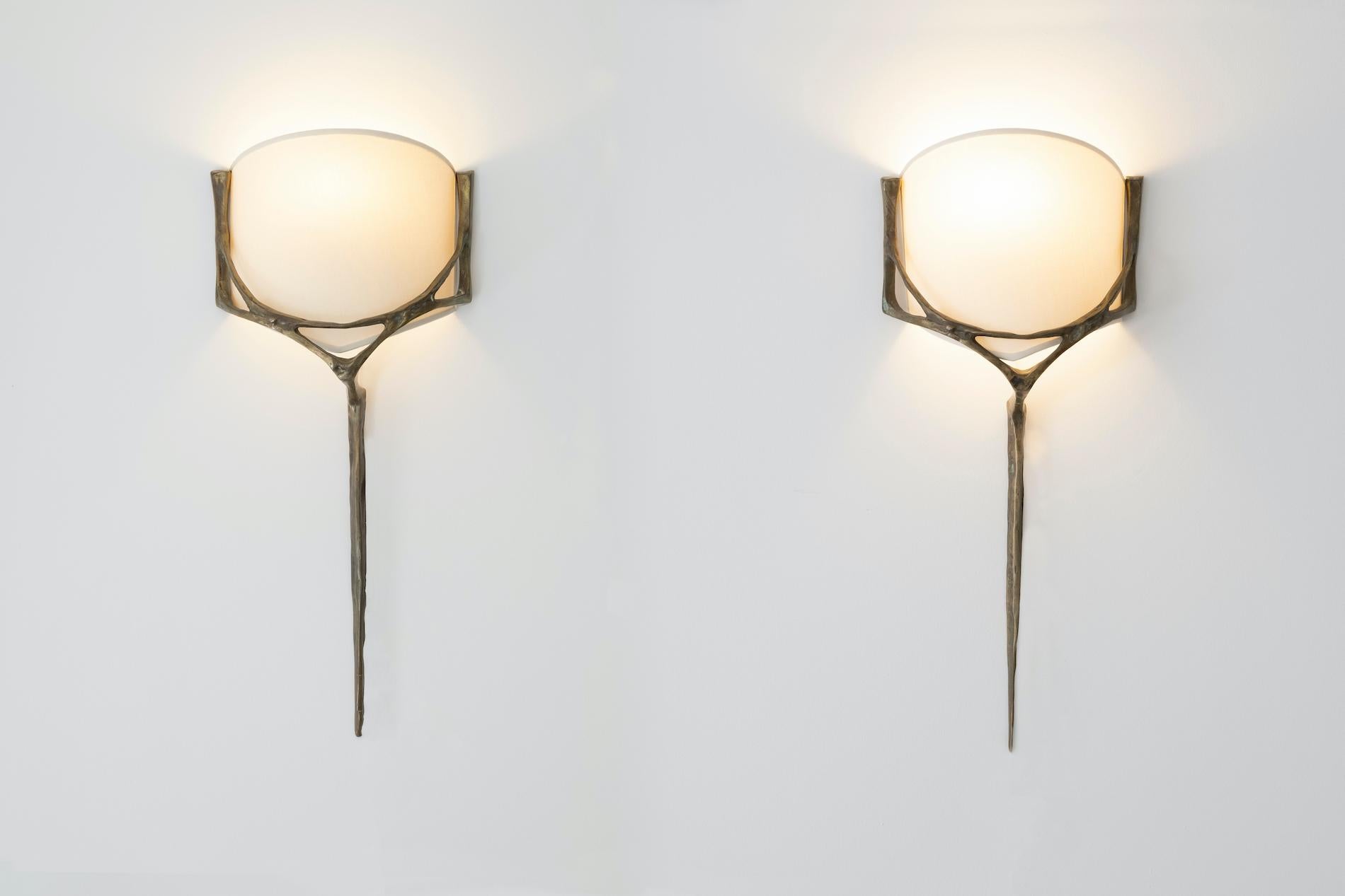 Félix AGOSTINI (1910-1980)

Very decorative large pair of wall sconces in solid bronze model.
France, 1957

New lampshades redone to match the original.

​Contact us for a shipping quote.