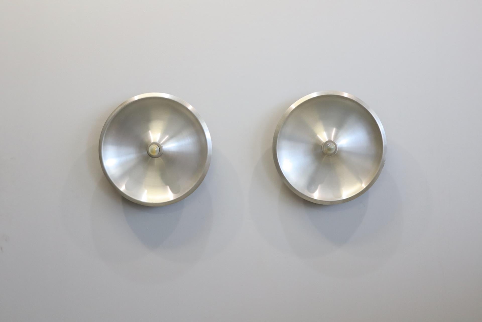 Ultra rare pair of wall lamps designed by Gino Sarfatti for Arteluce, Italy, 1971. This is for Mod.No. 262 in aluminum.