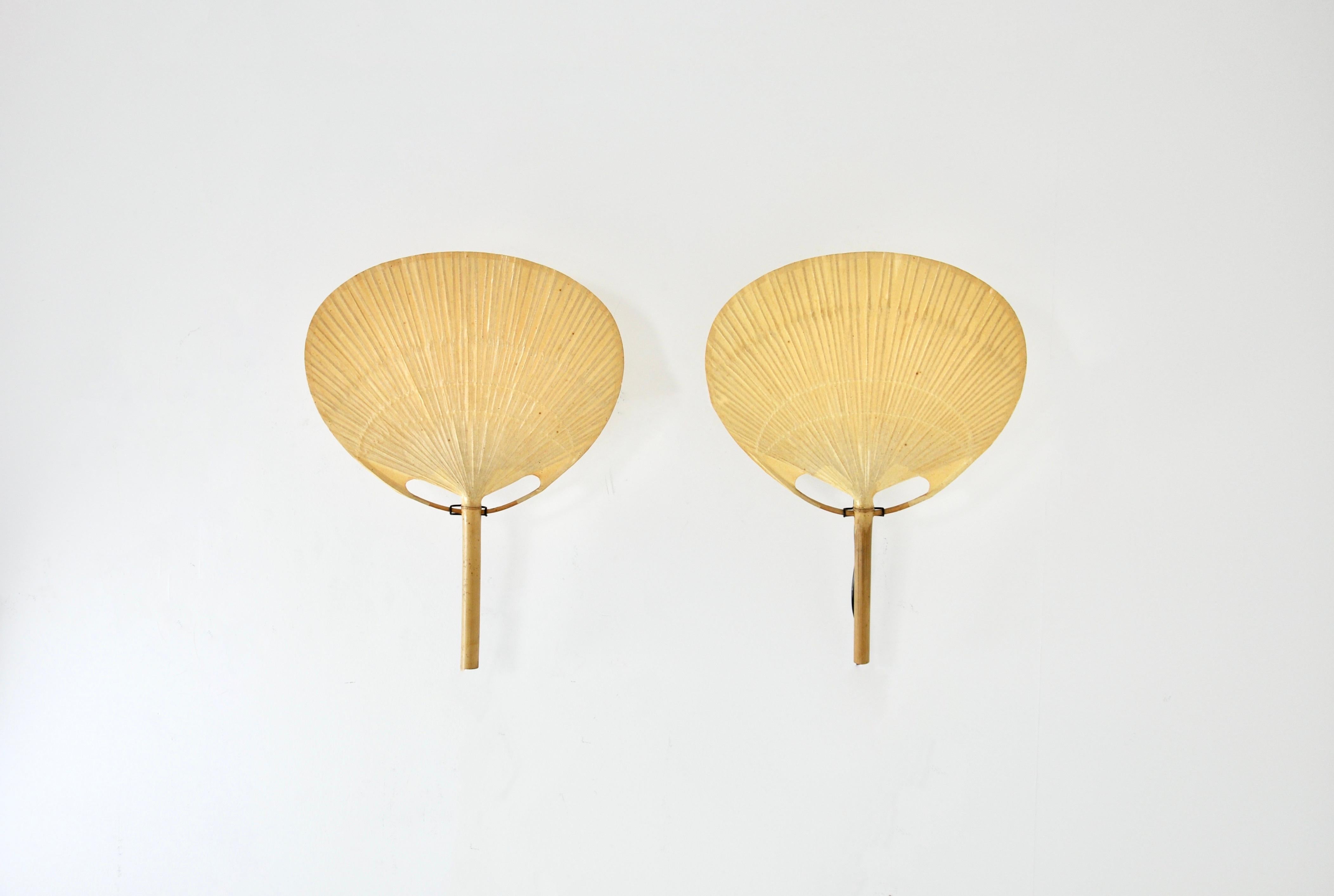 Pair of bamboo and paper sconces mounted on a metal stand by Ingo Maureur. Model: Uchiwa.  Wear due to time and age