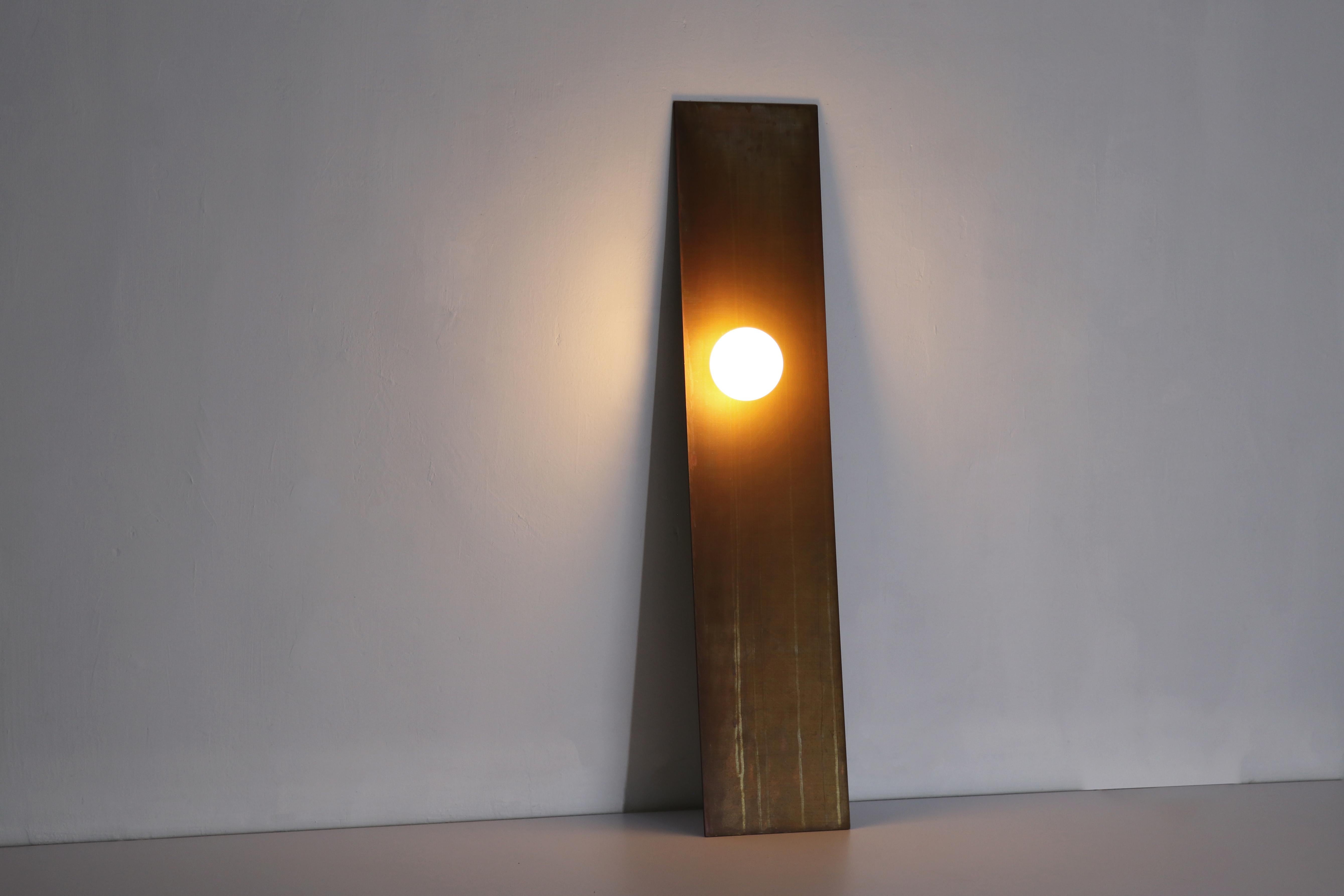 Wall leaning light by Batten and Kamp
Limited edition of 24 + 3 AP.
Dimensions: D 26 x W 2 x H 120 cm 
Materials: Weather worn copper
All our lamps can be wired according to each country. If sold to the USA it will be wired for the USA for
