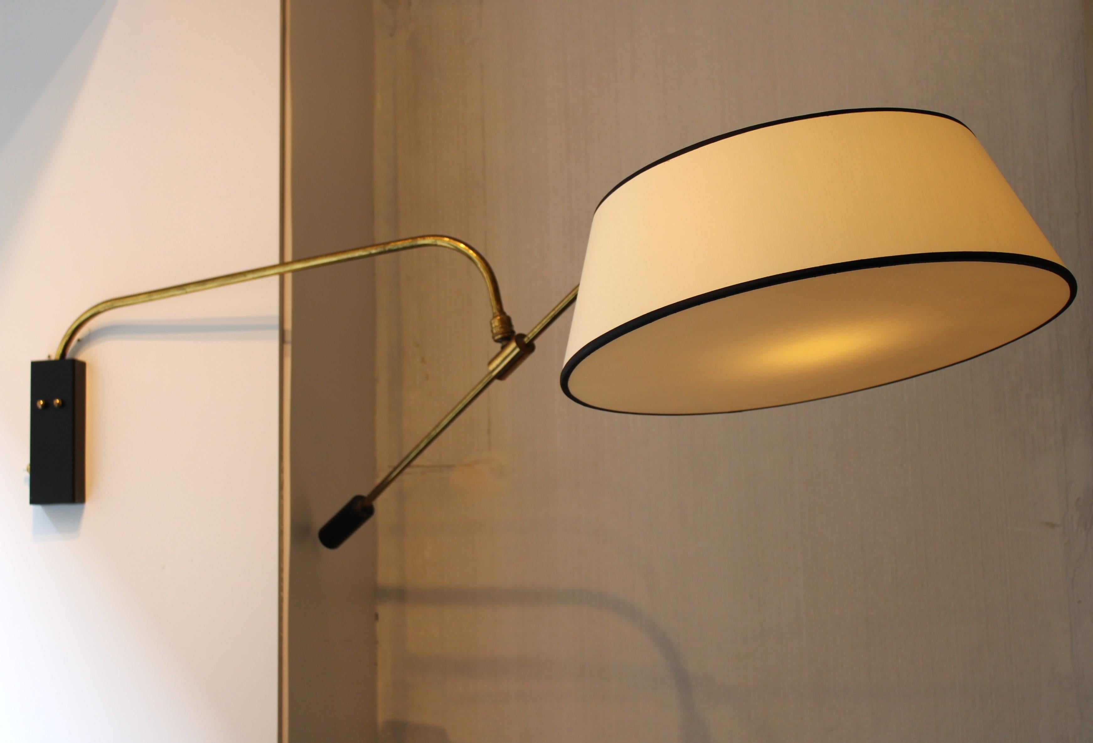 Wall lamp by Maison Lunel
Gilded metal
Articulated arm
France, circa 1950