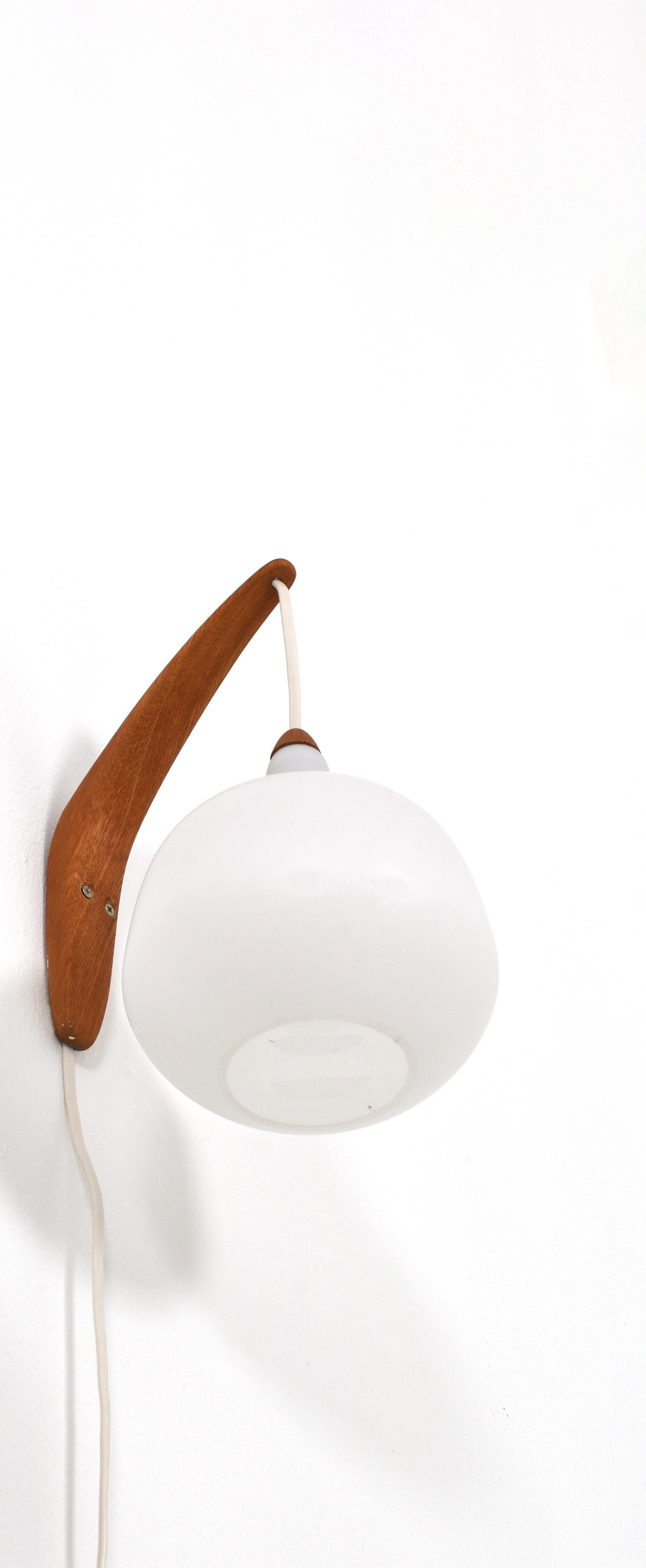Oak wall lamp in model 