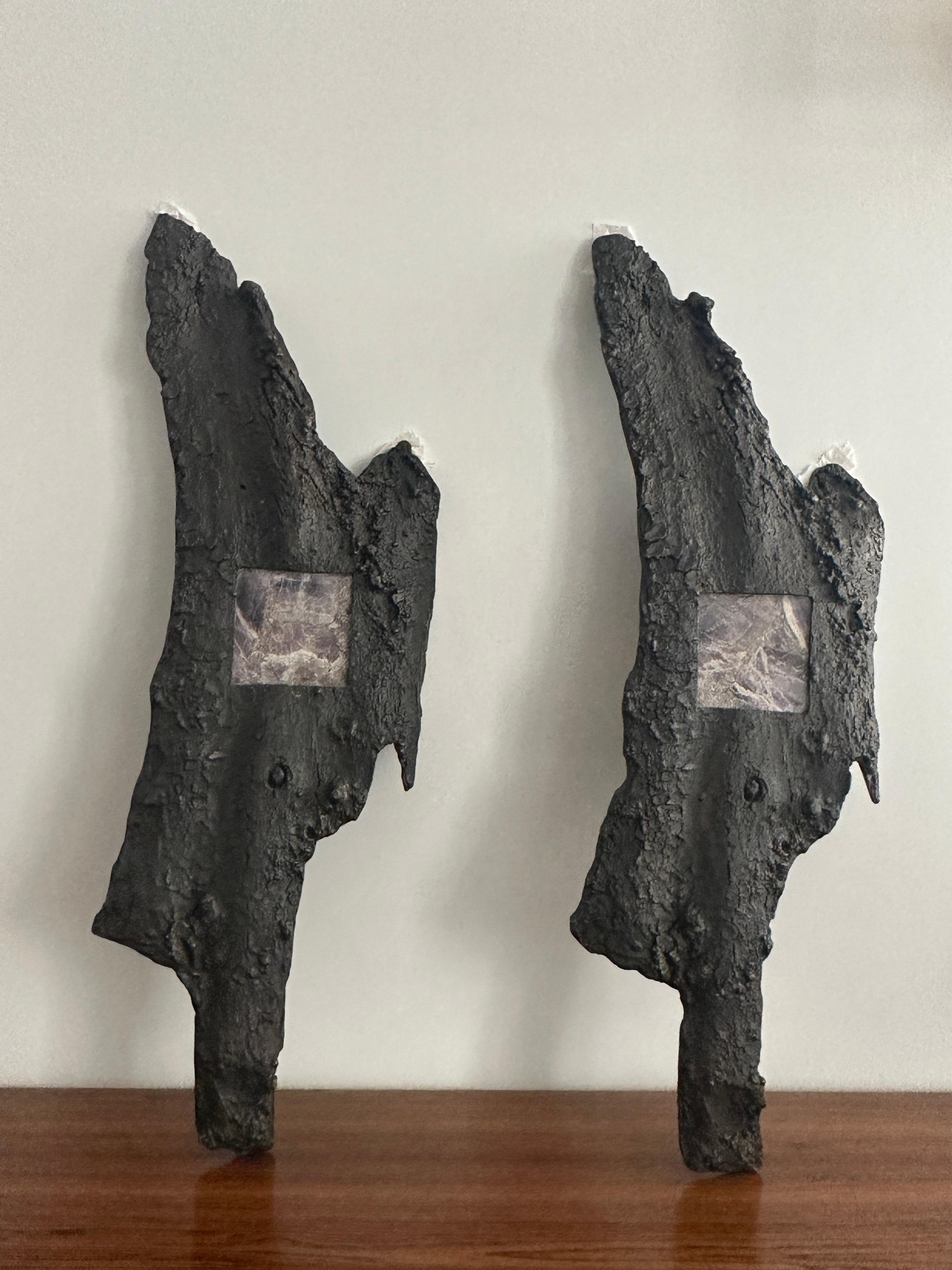 Anonymous wall light solid cast bronze and semi precious Amethyst stone, France, 1980
A pair of sconces in cast bronze in the shape of a tree bark, with an insertion of semi-precious stone that lets the light shine through
In the style of Marc du
