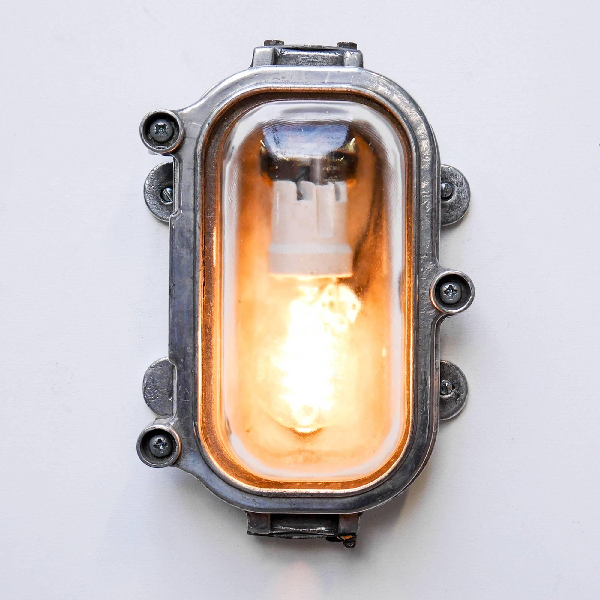 Old industrial wall light for outside, from URSS, in die- cast aluminium, picked and polished, thick transparent glass, offering a beautiful diffusion of light. Put it horizontally or vertically!

 