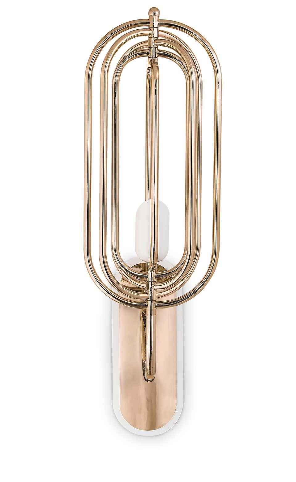 Wall light features a small lamp shade made in aluminium lacquered a matte white. Its structure is 100% handmade in brass with a gold-plated finish, adding an elegant and sophisticated touch to this unique wall sconce lighting. For this interior