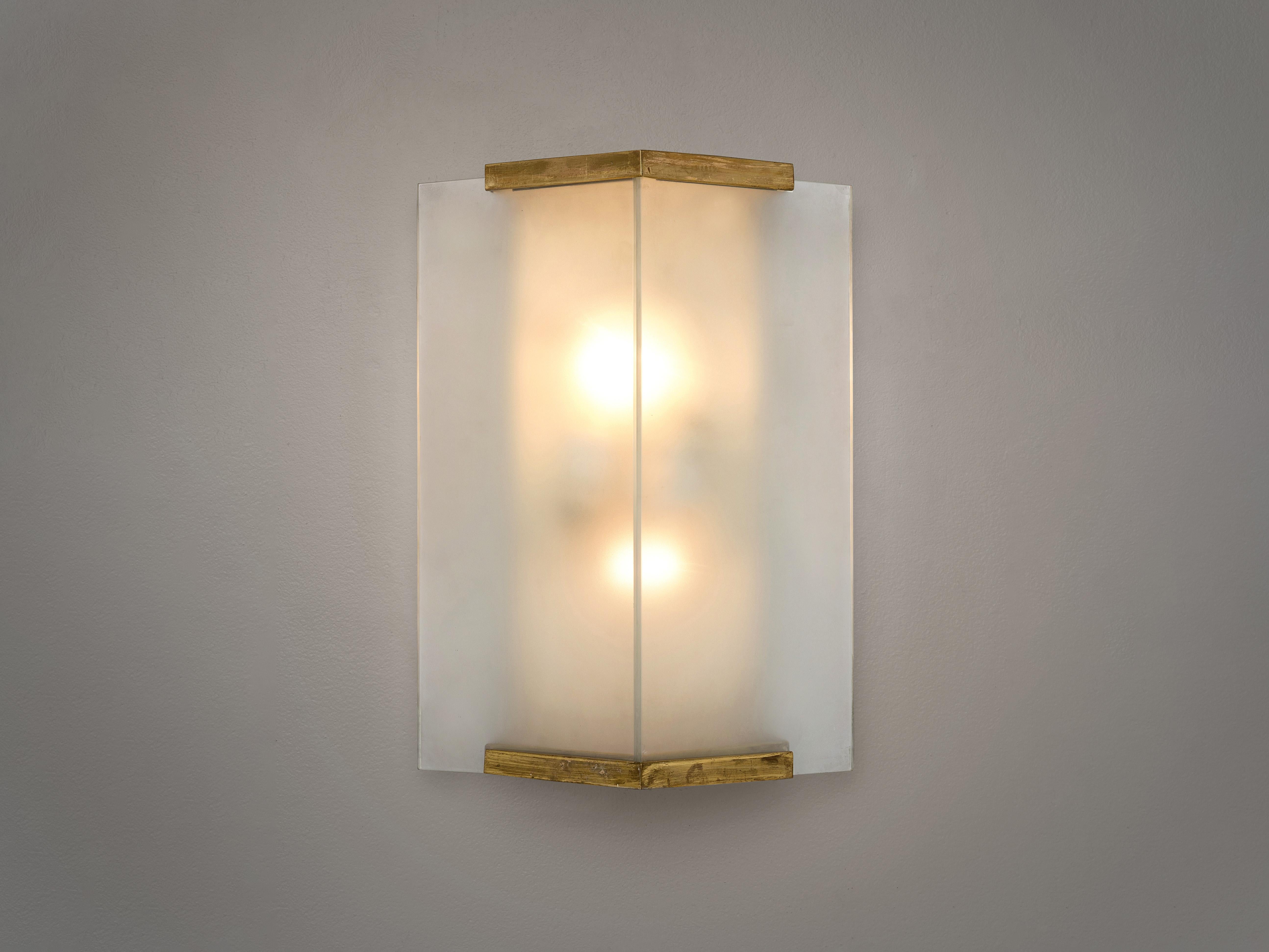 Wall lights, brass, frosted glass, Europe, 1930s.

These simplistic geometric sturdy wall lights give off a warm light partition thanks to the thick, high-quality glass. The lights feature a double, symmetrical lay-out with triangle glass
