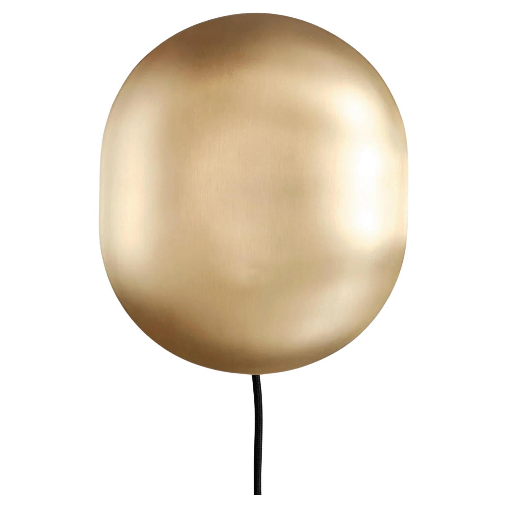 Aplique de pared, de metal dorado, pieza contemporánea.