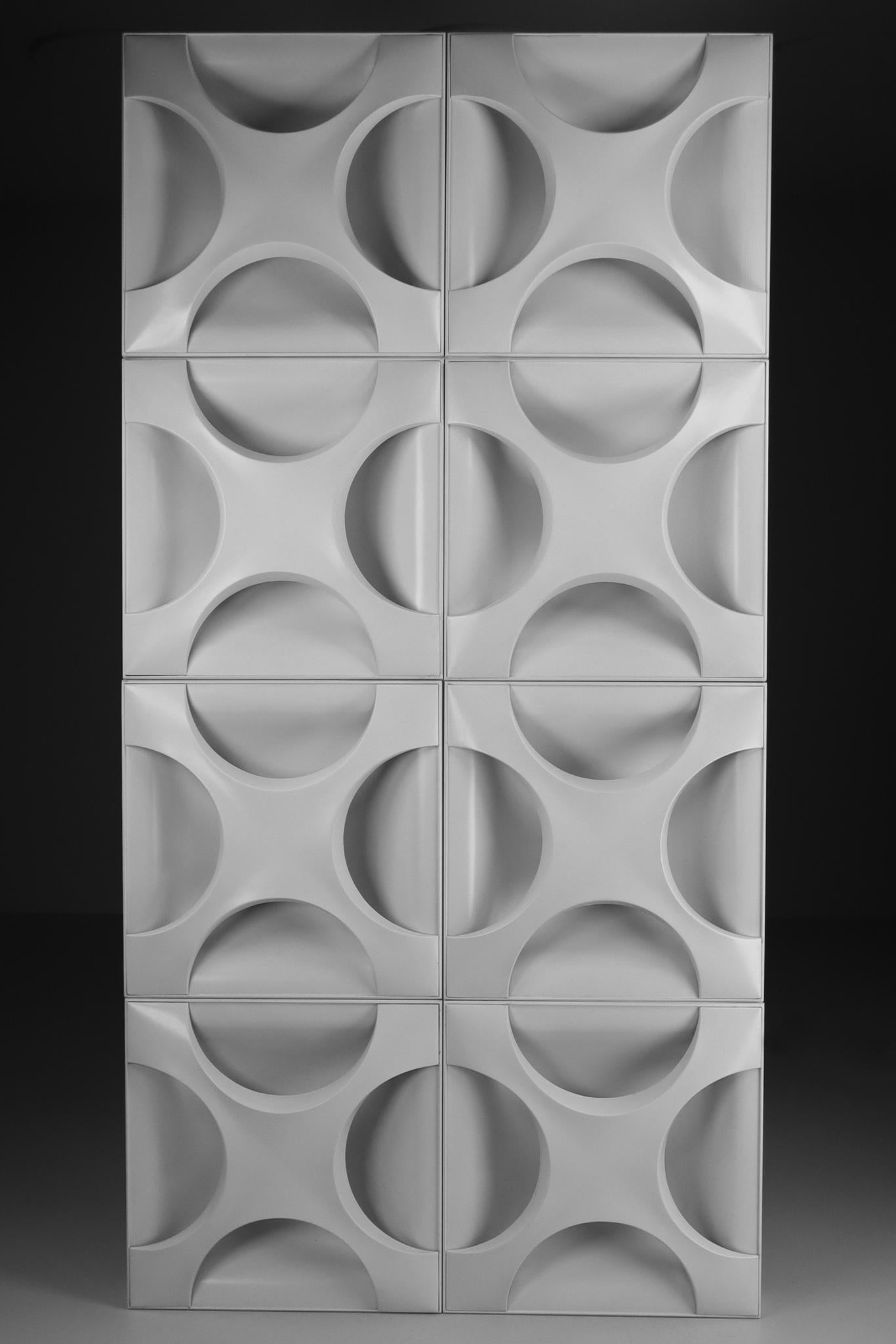 Large wall light sculpture designed by Dieter Witte and Rolf Krüger for Staff Leuchten, Germany, 1968.

Overwhelming oyster lacquer white wall light sculpture size 1.25 meter x 2.5 meter. 8 oyster elements built in a wooden frame to be arranged in