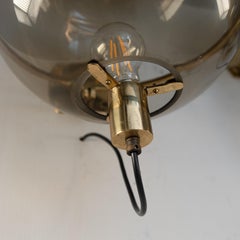 Wall light with smoked glass sphere and brass structure, set of 3