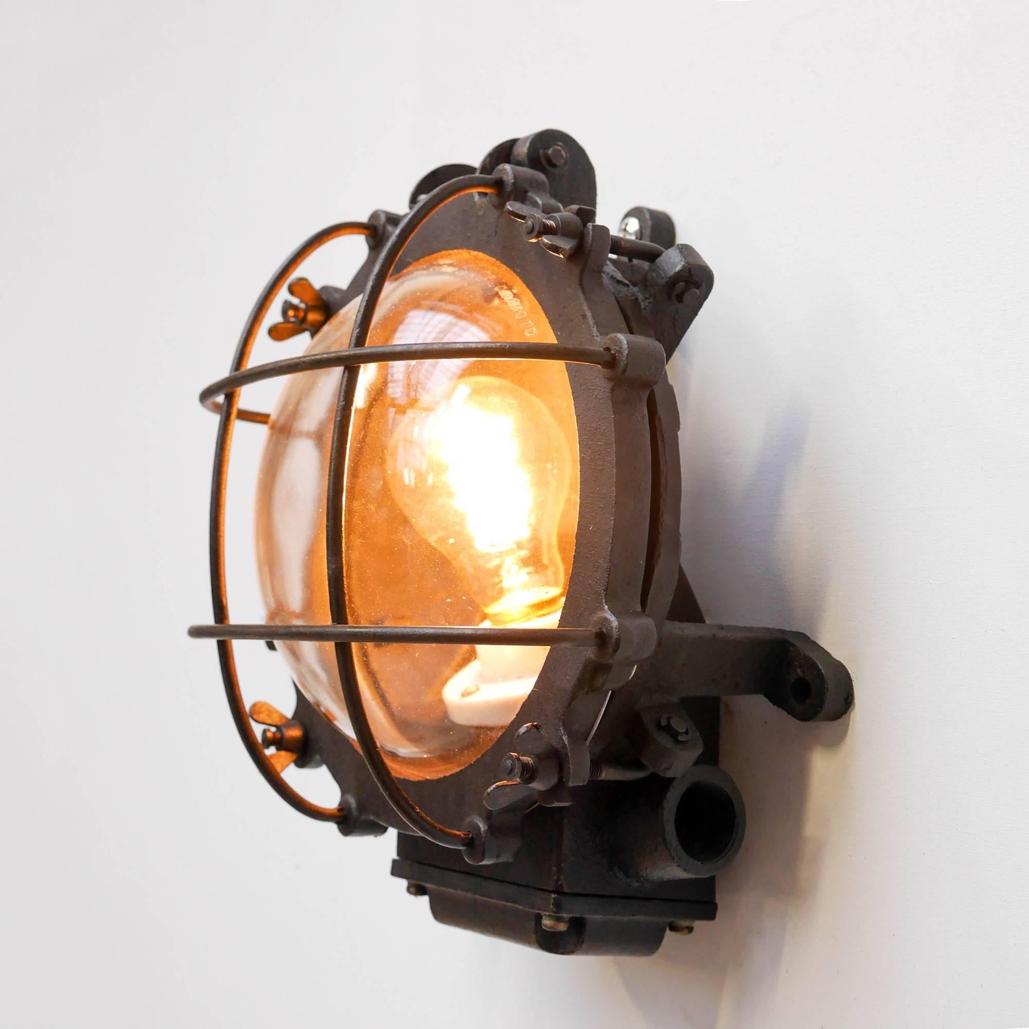 French Wall Light, Patinated Cast Iron, circa 1950 For Sale