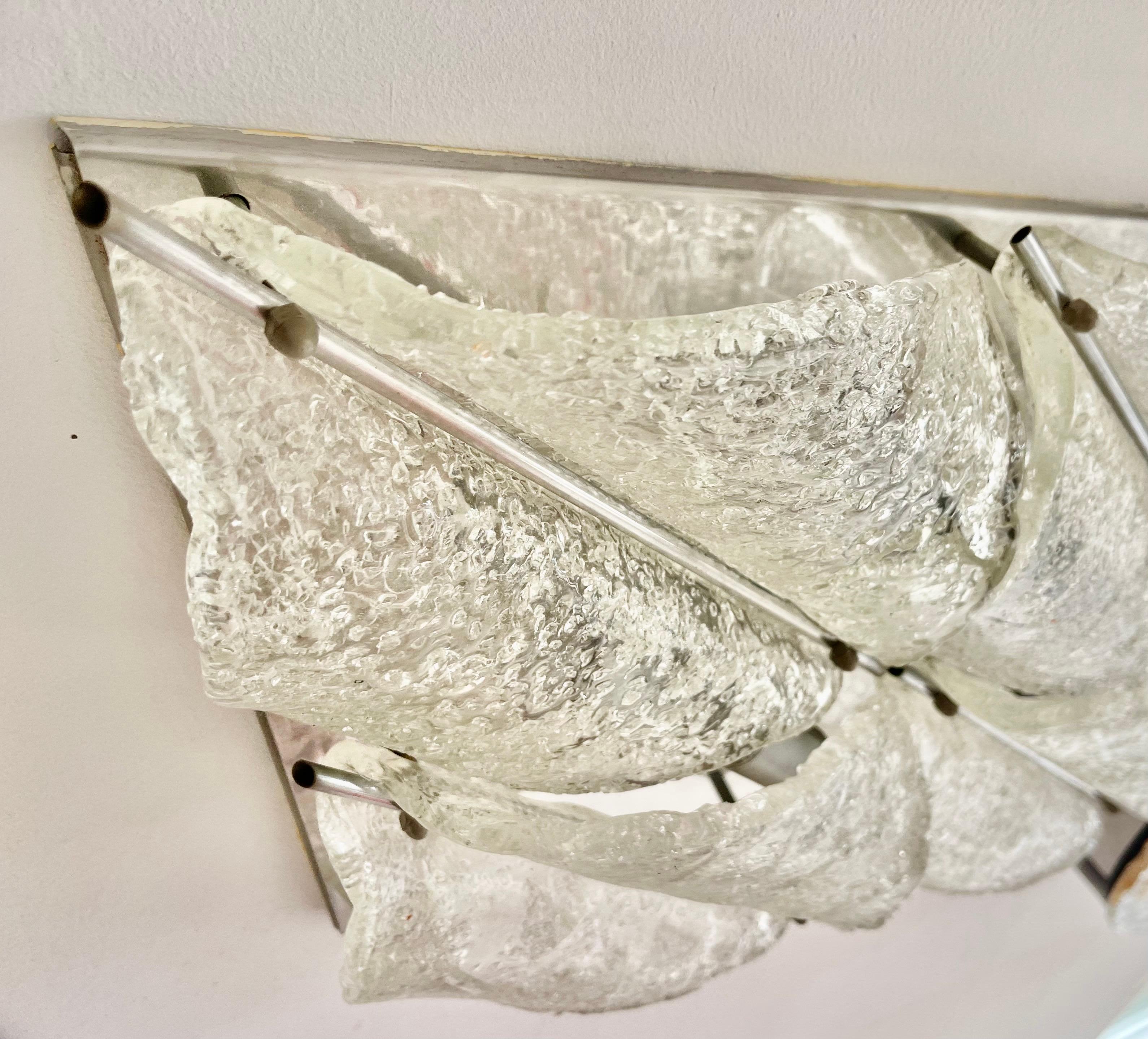 Exceptional Toni Zucherri by mazzega wall lighting ice frost glass Murano with structure. The Design and the quality of the glass make this piece the best of the italian Design.
This unique piece by Toni Zucherri wall lighting in ice frost glass