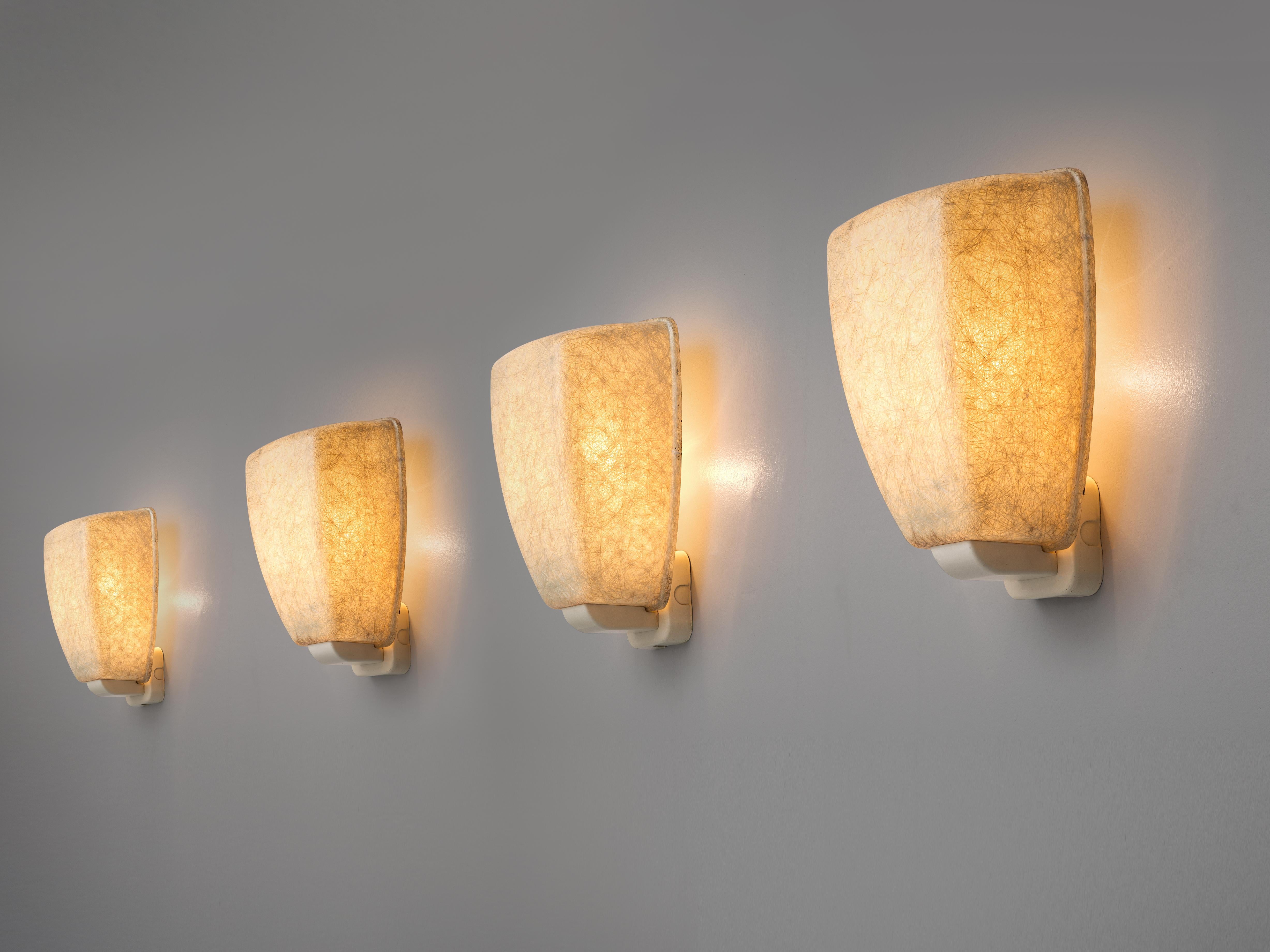 Wall lights, metal, fiberglass, Europe 1970s. 

Artistic wall lights of the seventies that embody a nice textured surface of intersecting lines. As a consequence, a transparent and atmospheric light is created. A simple design that bears visual