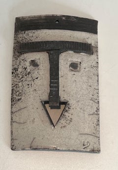 Wall Mask in Glazed Black and White Ceramic with a Stylised Face. Circa 1970