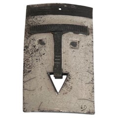 Wall Mask in Glazed Black and White Ceramic with a Stylised Face. Circa 1970