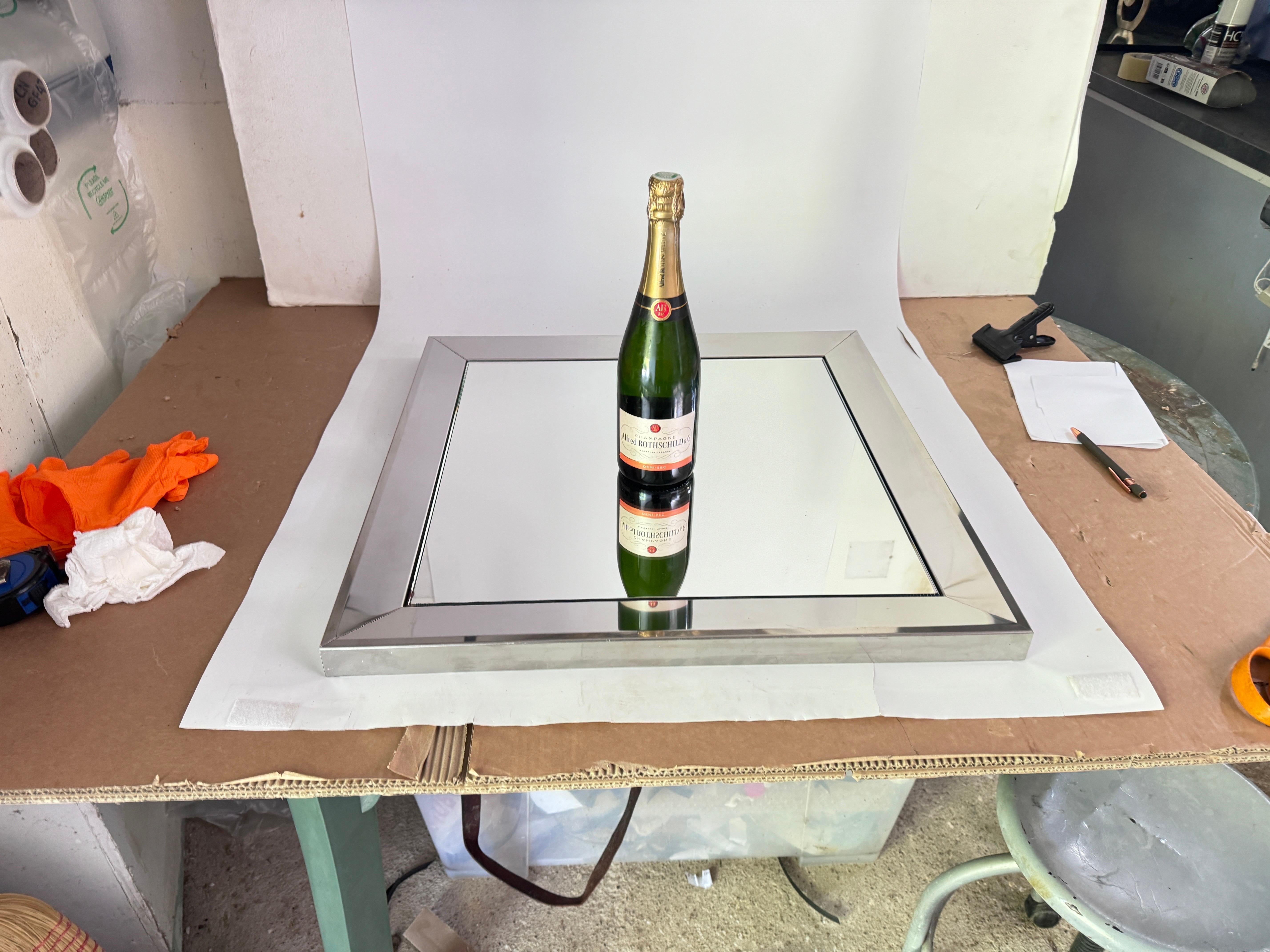 This mirror is heavy, it is made in Aluminium. The production was in the 1970s in France and chome
