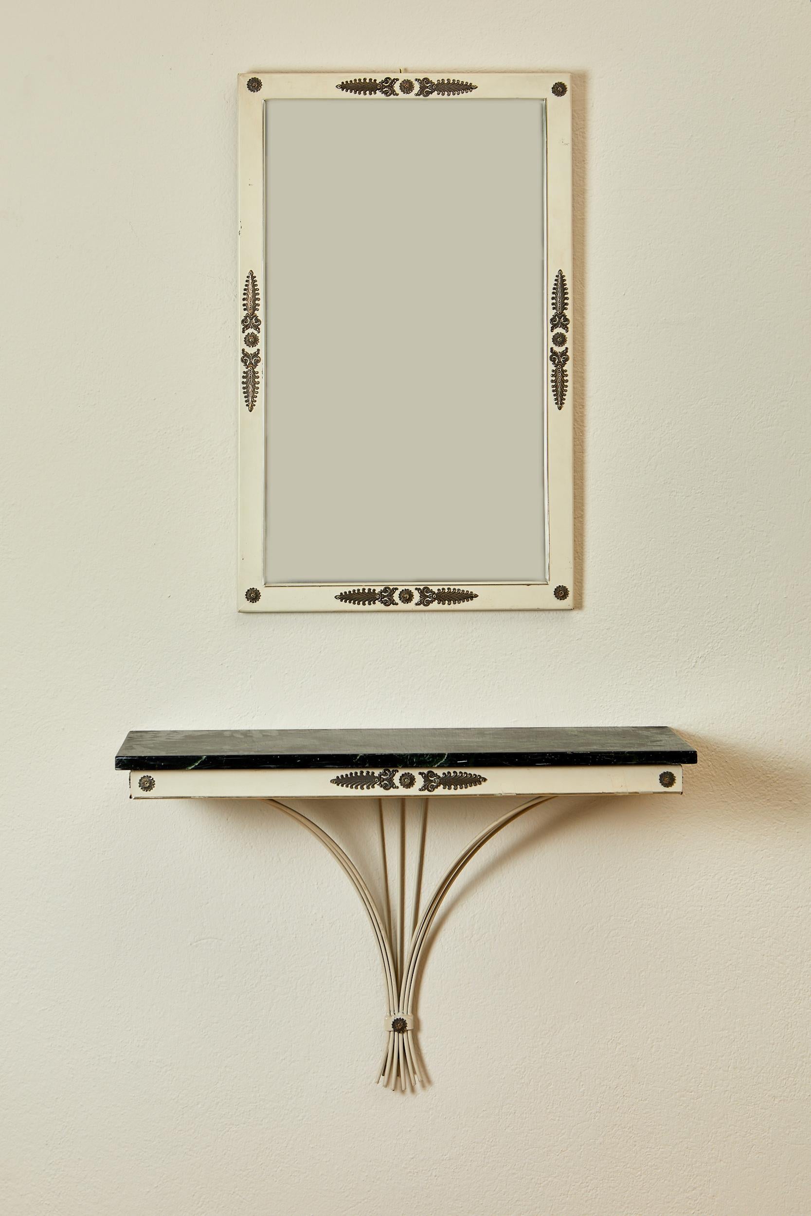 Wall mirror and console set,
lacquered iron and gilded brass,
marble top, sea green, gilt brass plates, circa 1950, France.
Mirror: height 80 cm, width 50 cm, depth 2 cm.
Console: height 31 cm, width 76 cm, depth 23 cm.



