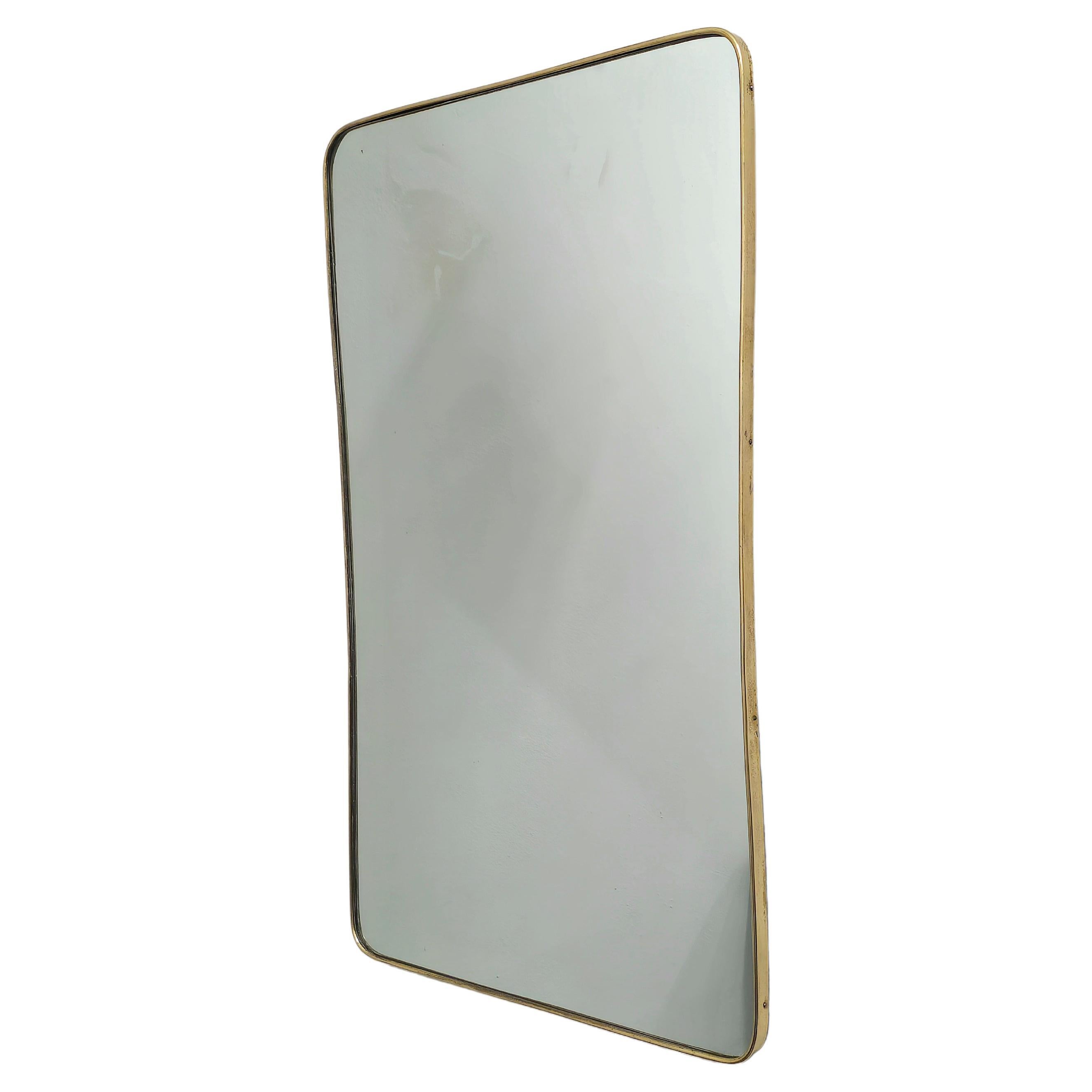 Attributable to Gio Ponti, Italy, 1950s.
Wall mirror of considerable size, rectangular shape in mirrored glass and brass frame with internally curved sides and rounded corners.
We recommend this piece for its elegance and its shapes.


Note: We try