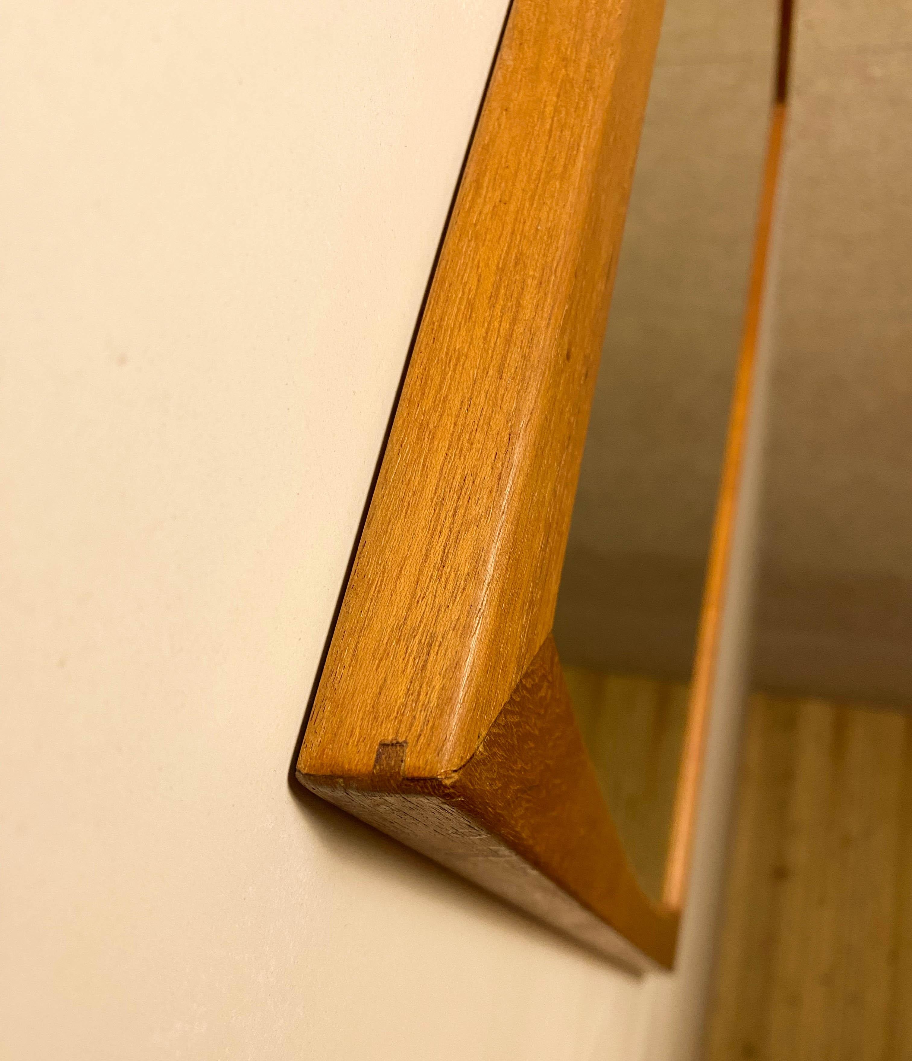 Wall mirror by Aksel Kjesrsgaard with shelf and drawers.
The mirror has got a signature mark Aksel Kjesrsgaard , the shelf and drawers dont have any mark.