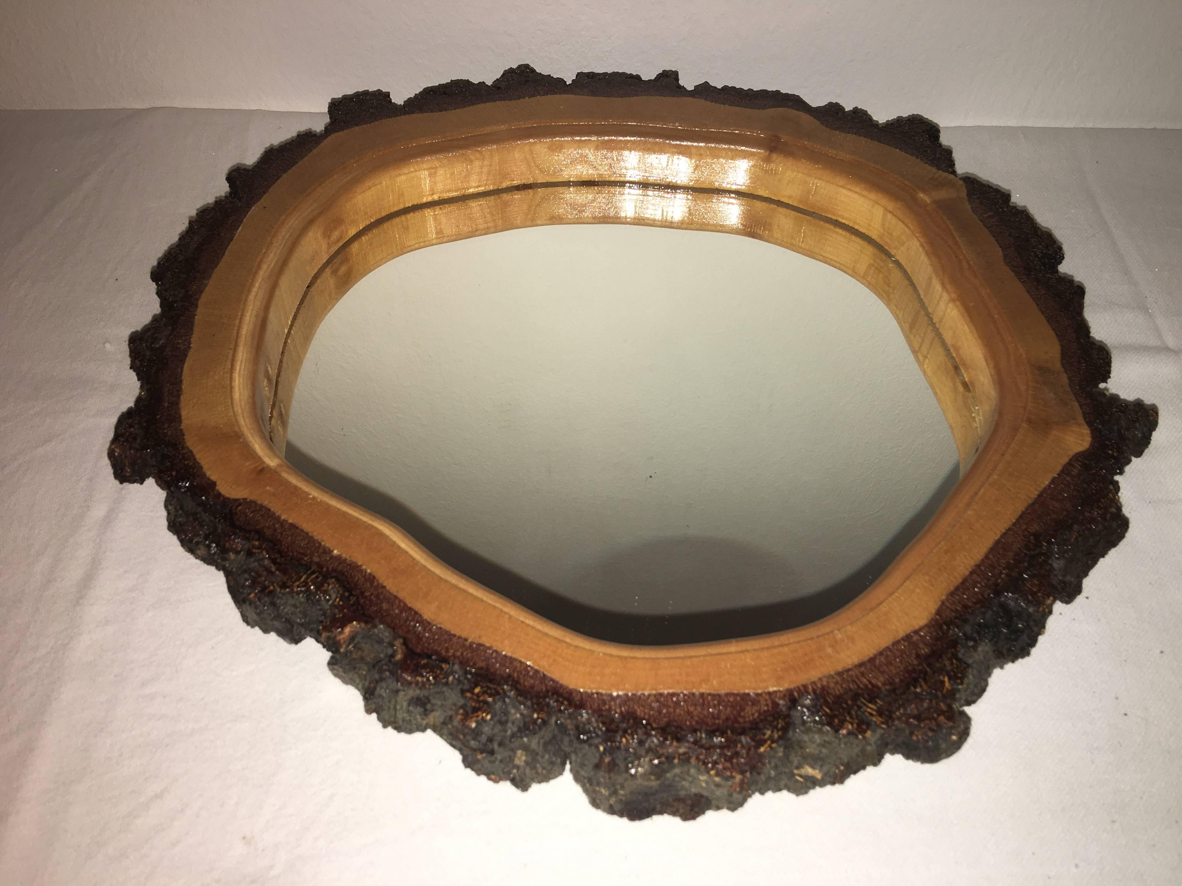 A beautiful wall mirror made in Austria in the 1950s. Please notice, that there are 2 small spots on the mirror glass.