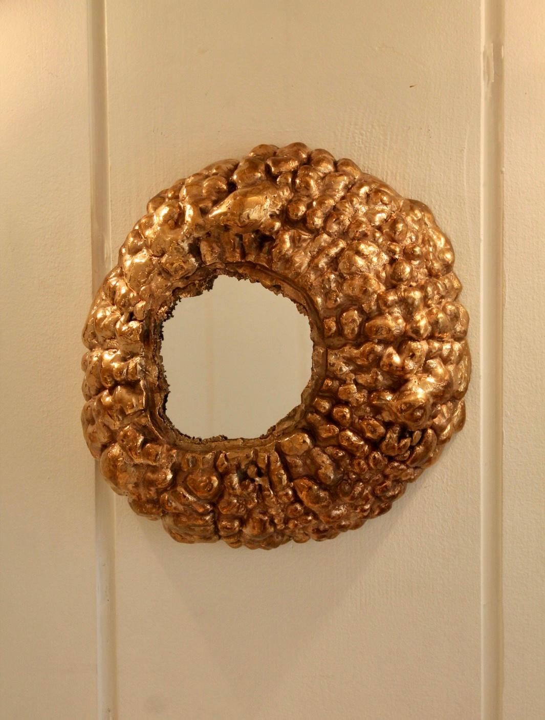 Wall Mirror by Clotilde Ancarani 
Contemporary artist 
Gilded bronze 
signed by the artist with  stamp
Diameter : 29 cm, Depth : 10 cm
