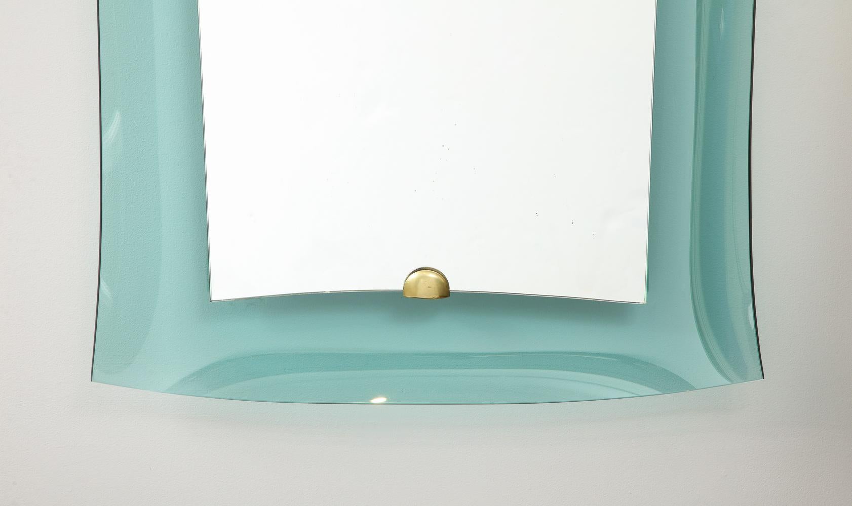 Model #2712 by Cristal Art features a concave green glass frame with a raised mirrored center held by brass hardware.