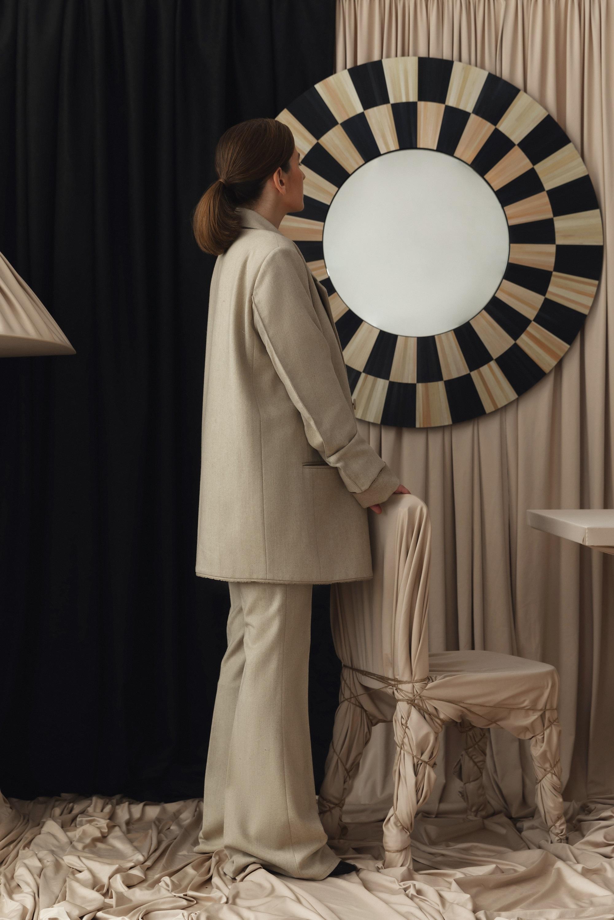 Wall mirror in a straw marquetry technique. Handcrafted from rye straw.
We create not just functional objects, but talk to society through our products. 
A mirror symbolizes truth, frankness and reflection of the soul. That is why we use this object
