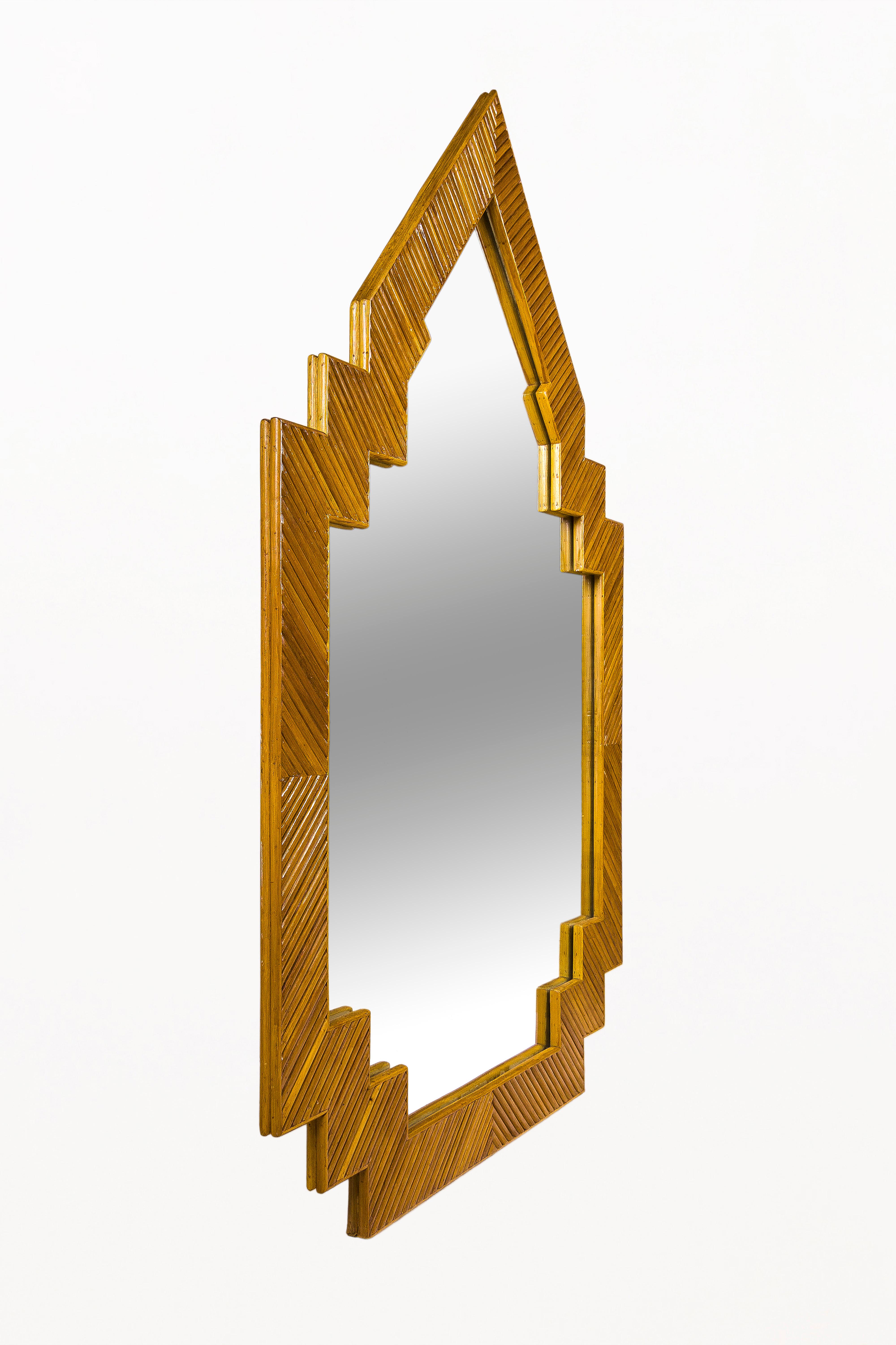 Wall mirror
Mirror with bamboo frame.
Large mirror and Frame.
Very well made
circa 1970, France 
Very good vintage condition.