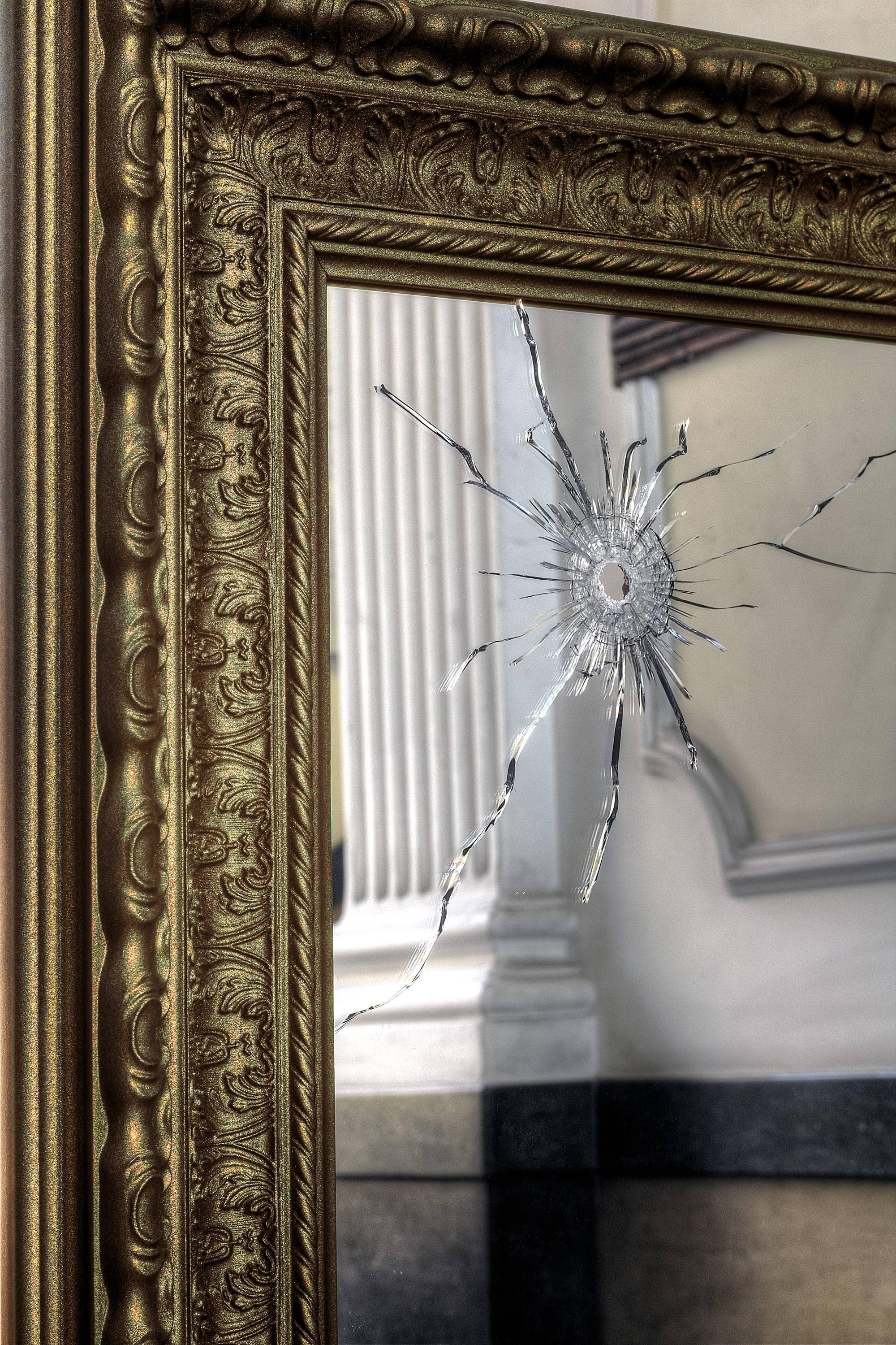The 'Seven Years' wall mirror is made of security-glass, mirror hit by gunshots and gold wooden frame. 

Mirror dimension: L 180 x W 105 cm. Dimensions are customizable.

Limited Edition of 15.

Each mirror is hand signed and numbered by the artists