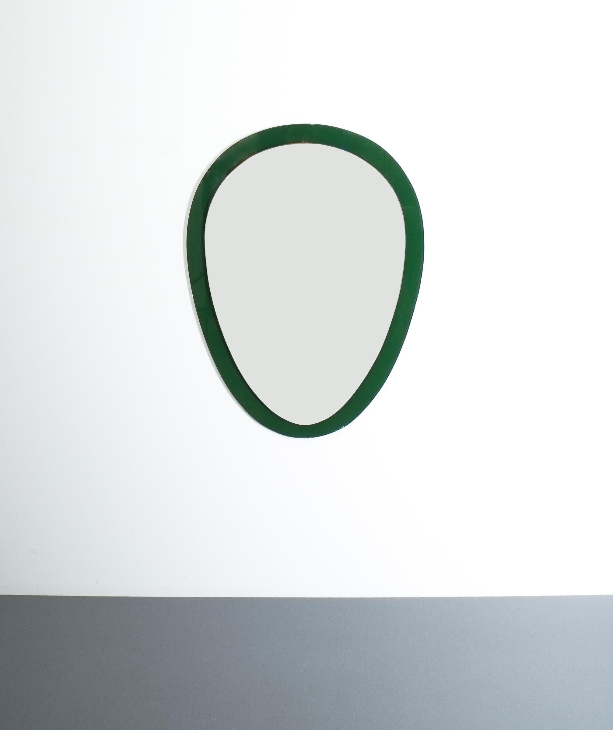 Tear-shaped Italian wall mirror pinned on a glass frame with mounted green foil to the back. Good condition with some scratched on the foil, mirror is in good condition with minimal scratches.
  