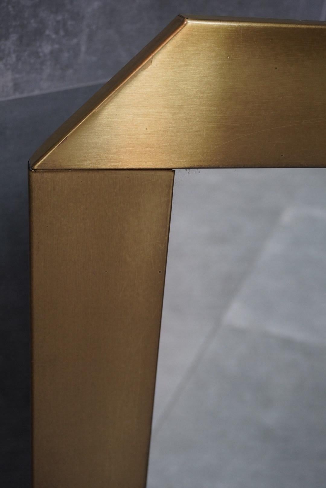 Elegant mid-century wall mirror crafted in Italy in the 1960s and designed by Valenti.