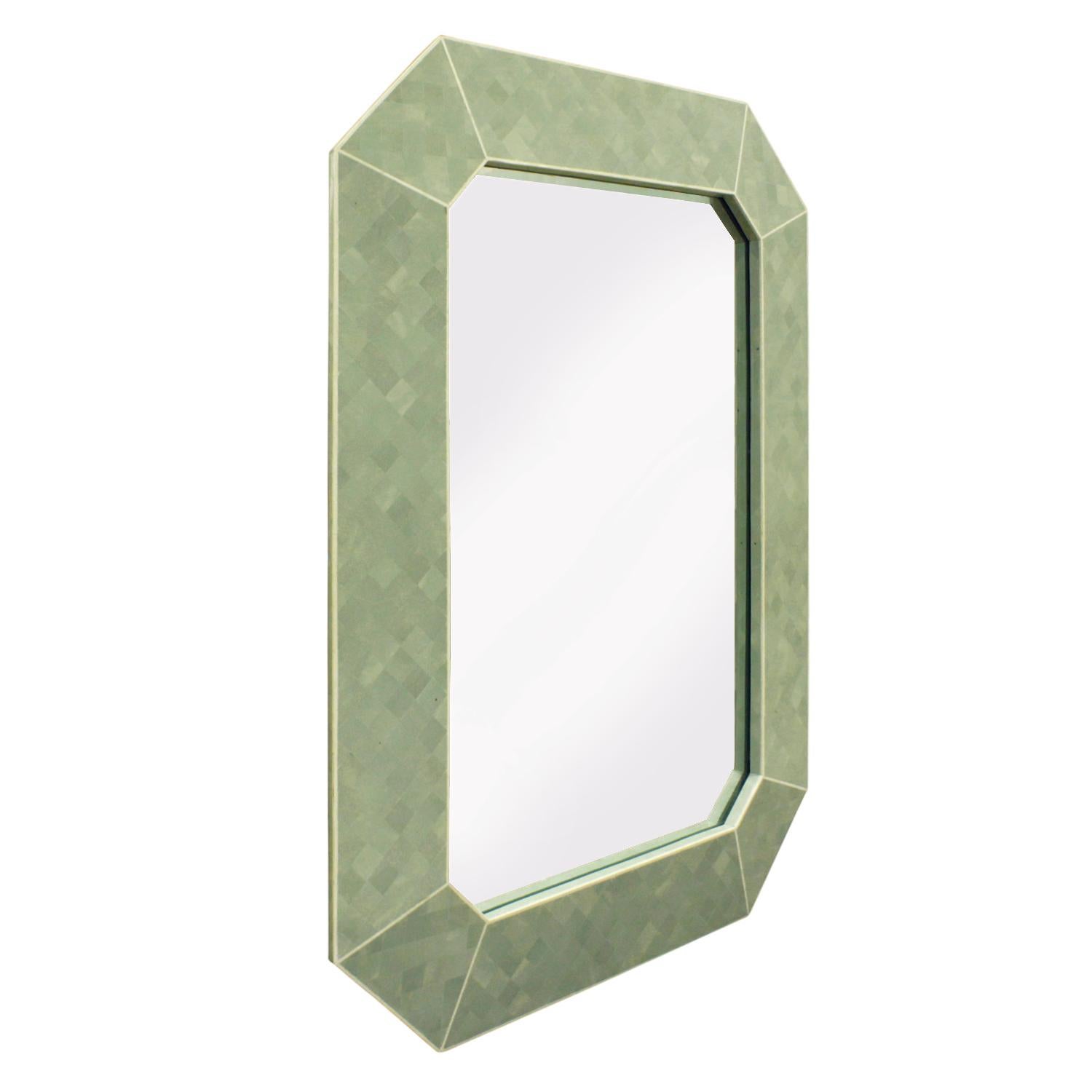 Octagonal wall hanging mirror in green tessellated stone with bone inlays by Maitland Smith, American 1970s. This mirror is meticulously made and the color is beautiful.