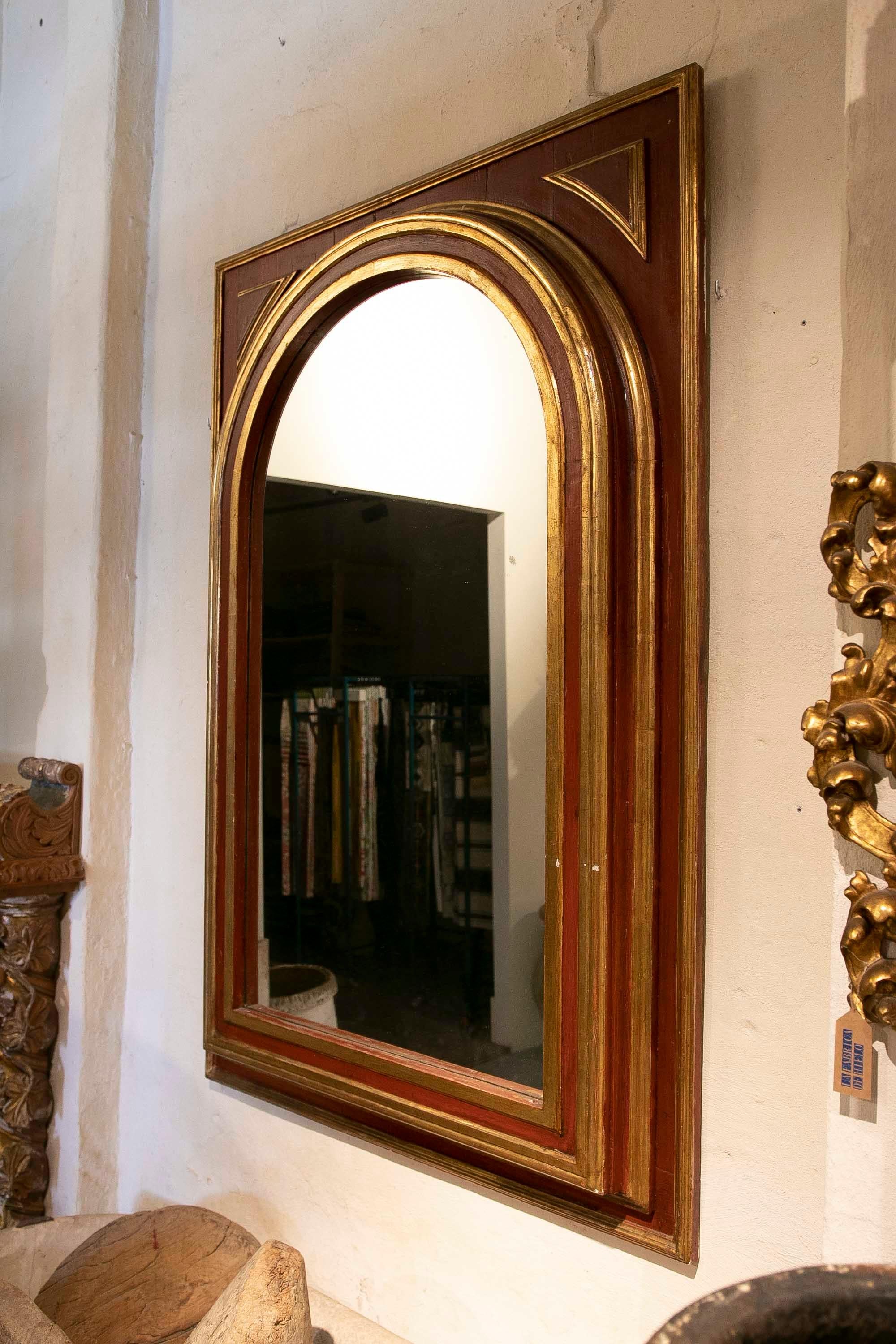 Spanish Wall Mirror in the Shape of a Semicircular Arch in Reddish and Gold