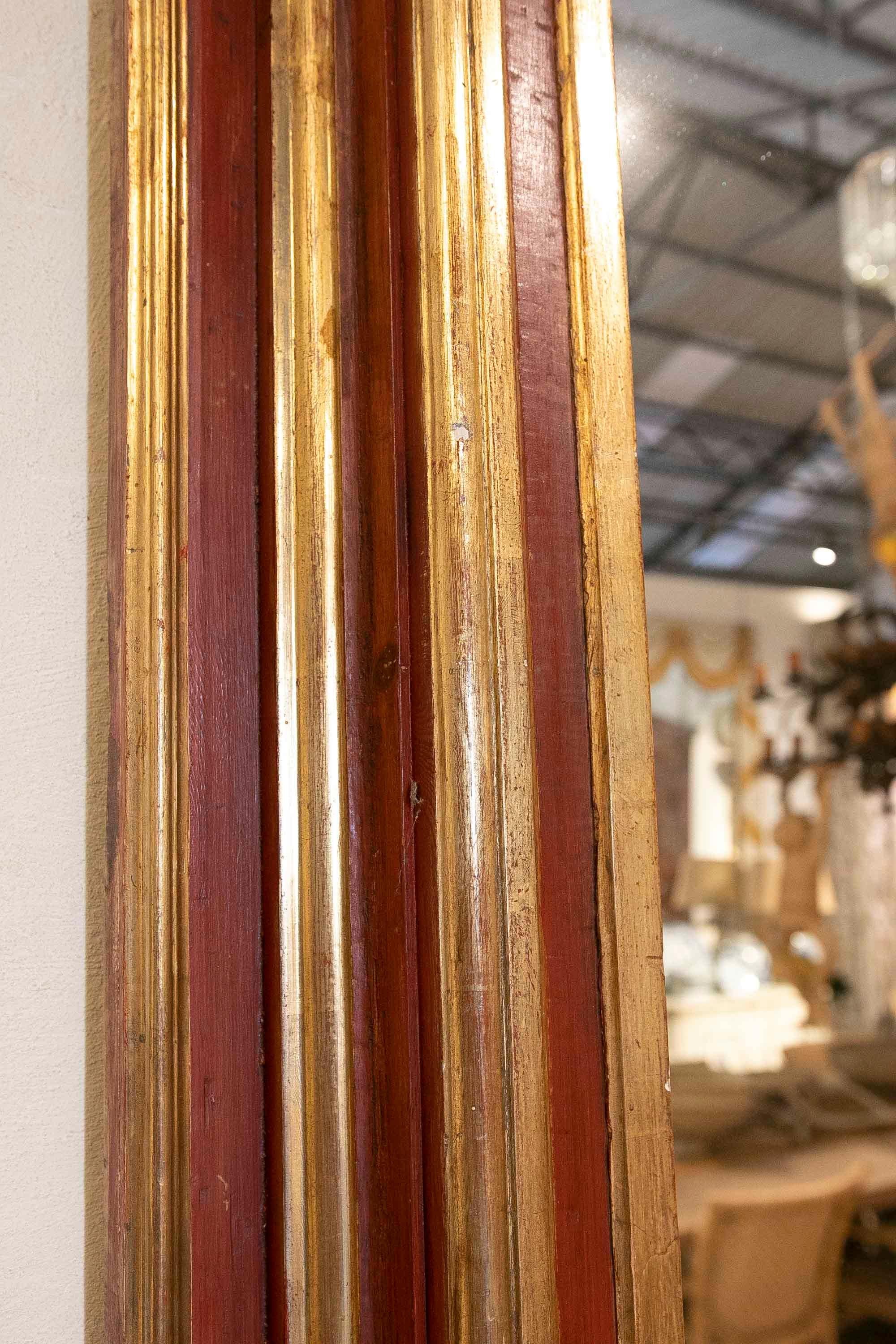 Wall Mirror in the Shape of a Semicircular Arch in Reddish and Gold 1