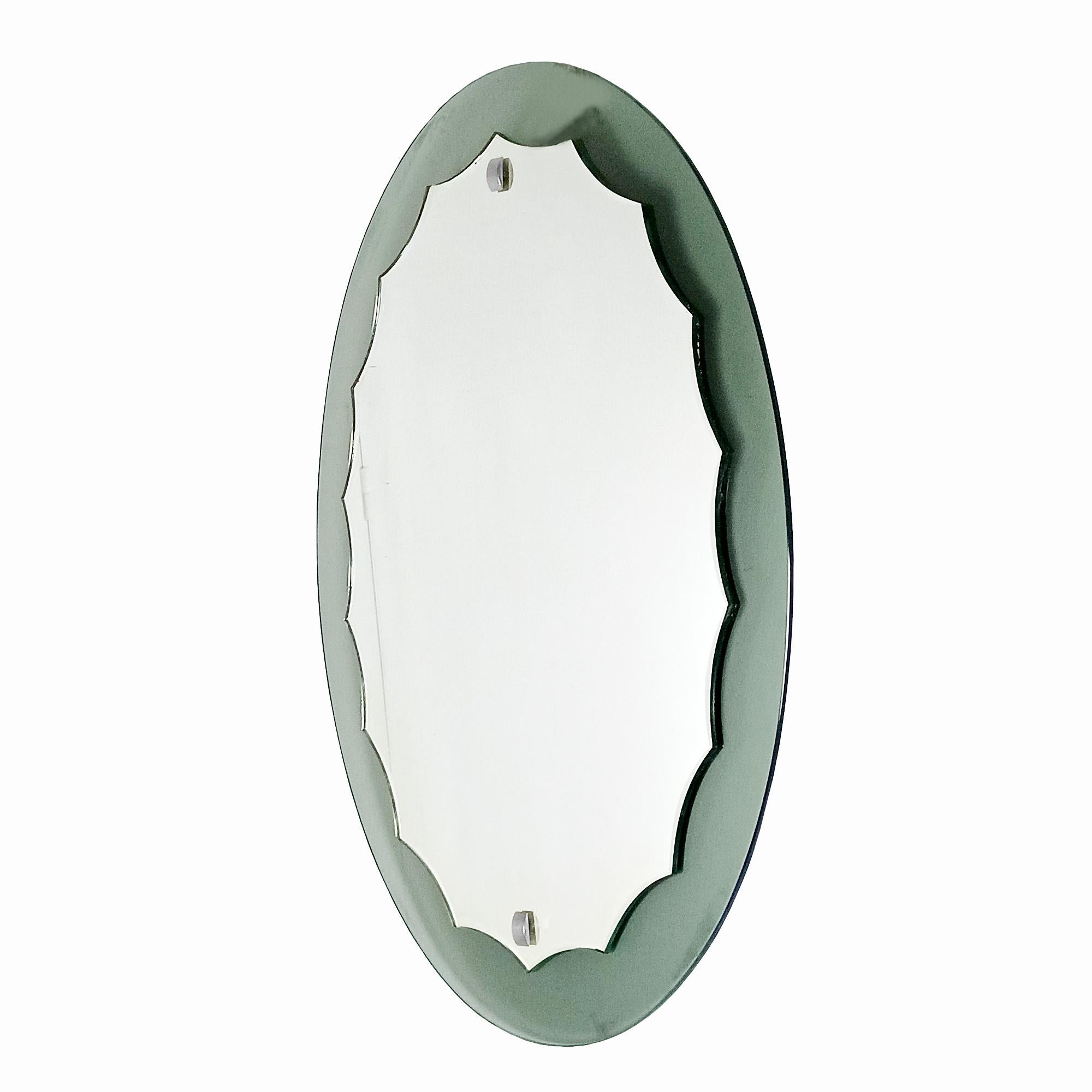 Wall mirror with gray back glass, festooned bevelled crystal and chrome metal finishes.

Italy circa 1960.